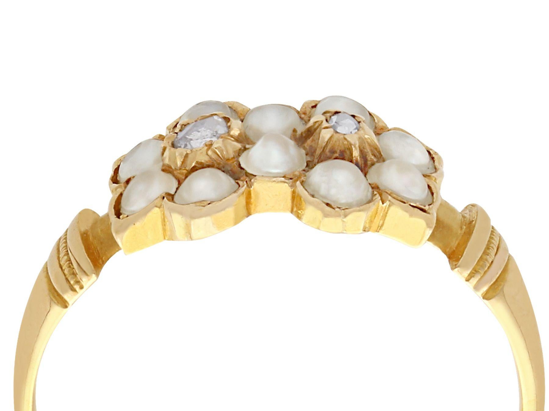 A fine and impressive antique Victorian seed pearl and 0.05 carat diamond and 18 karat yellow gold dress ring; part of our antique jewelry/estate jewelry collections.

This fine antique dress ring has been crafted in 18k yellow gold.

The impressive