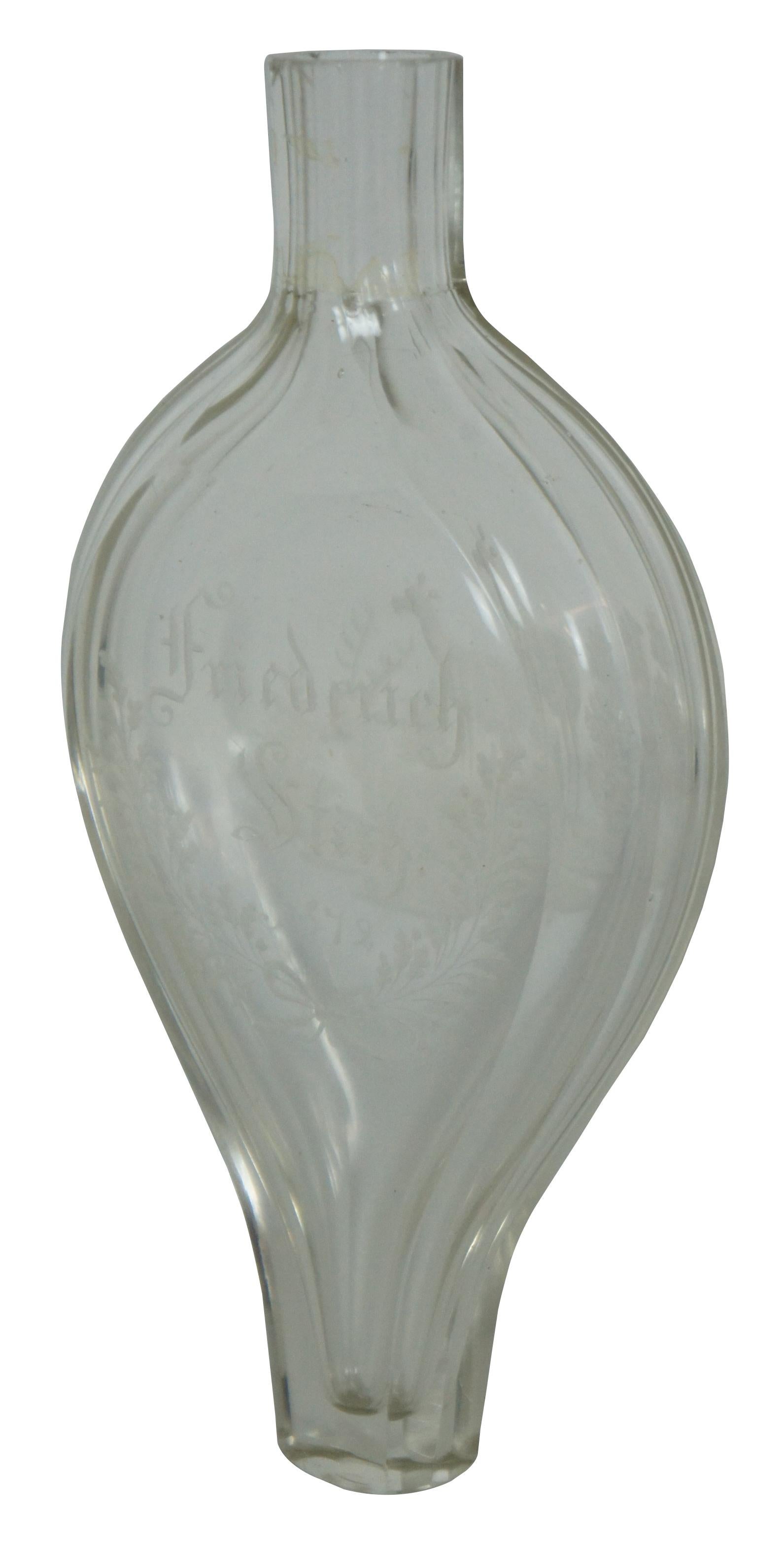 Rare antique late 19th century German etched glass perfume bottle / apothecary decanter or bud vase featuring unusual teardrop form with a narrow octagonal base and top. Eetched on one side with the words Friederich Stioh 1872 above a pair of oak