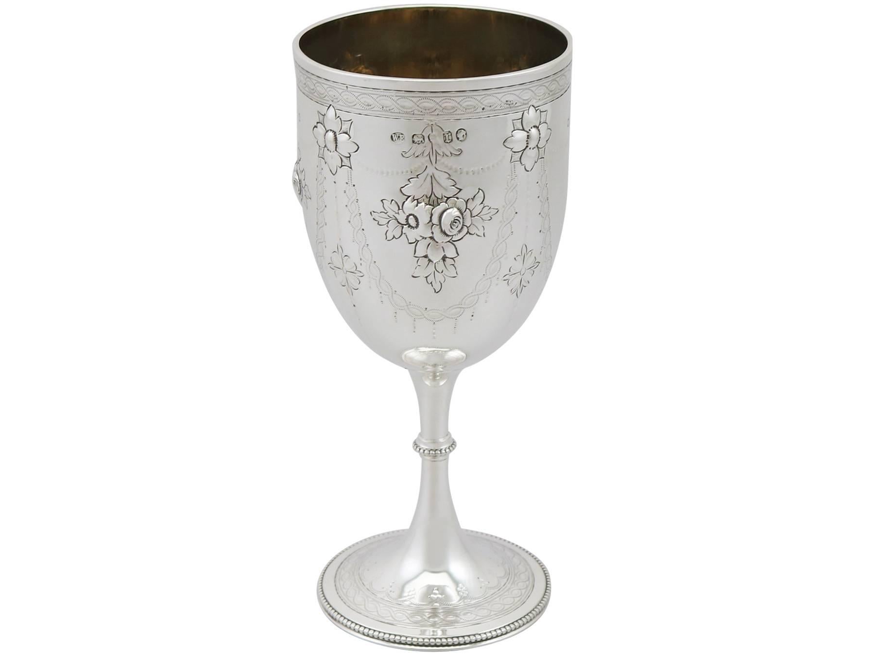 An exceptional, fine and impressive antique Victorian English sterling silver goblet made by William Evans; an addition to our collection of wine and drinks related silverware.

This exceptional antique sterling silver drinking goblet has a