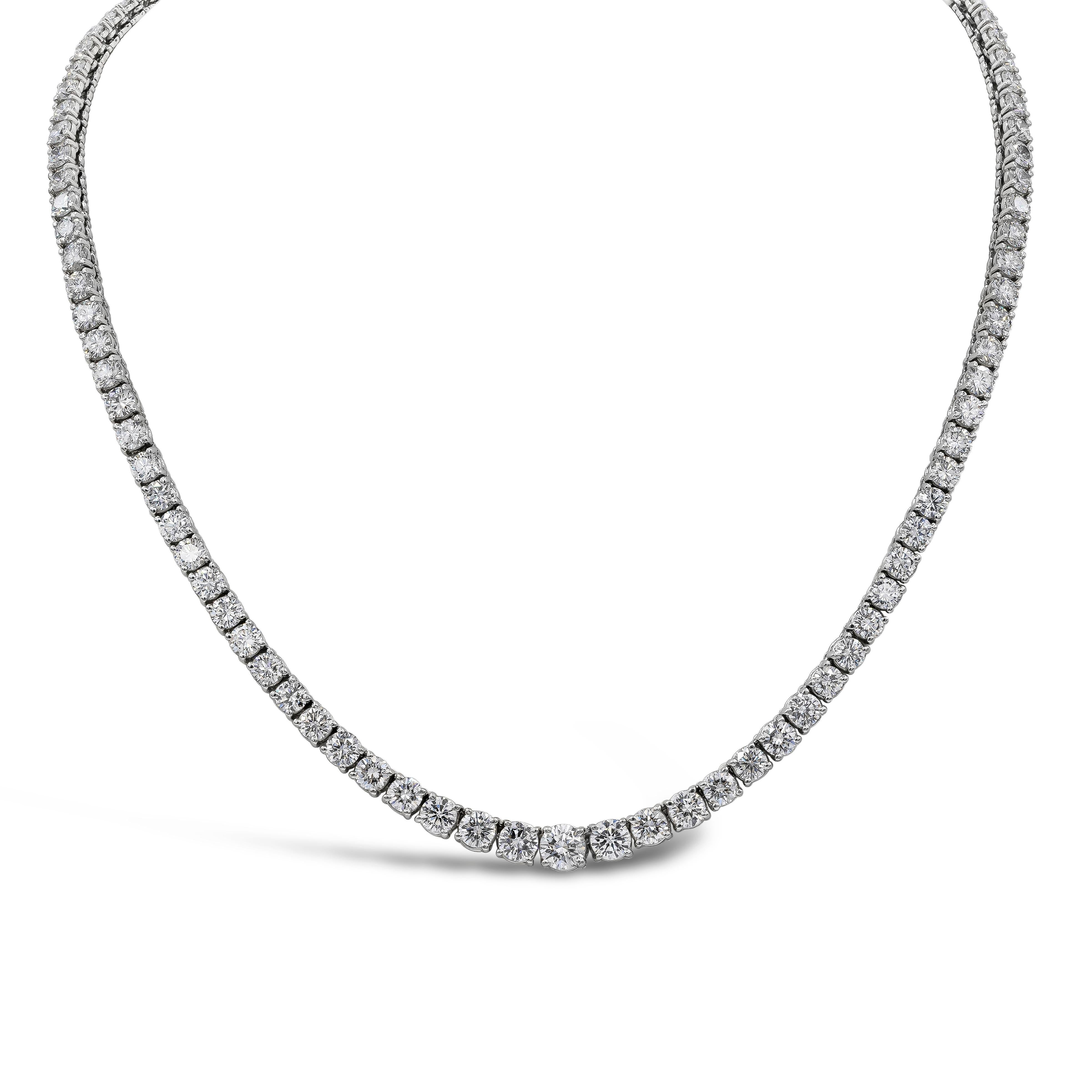 A simple yet very brilliant piece showcasing round diamonds that elegantly graduate larger as it reaches the center of the necklace. Diamonds weigh 18.75 carats total and are very fine quality (approximately G color, VS+ quality). Made in platinum.