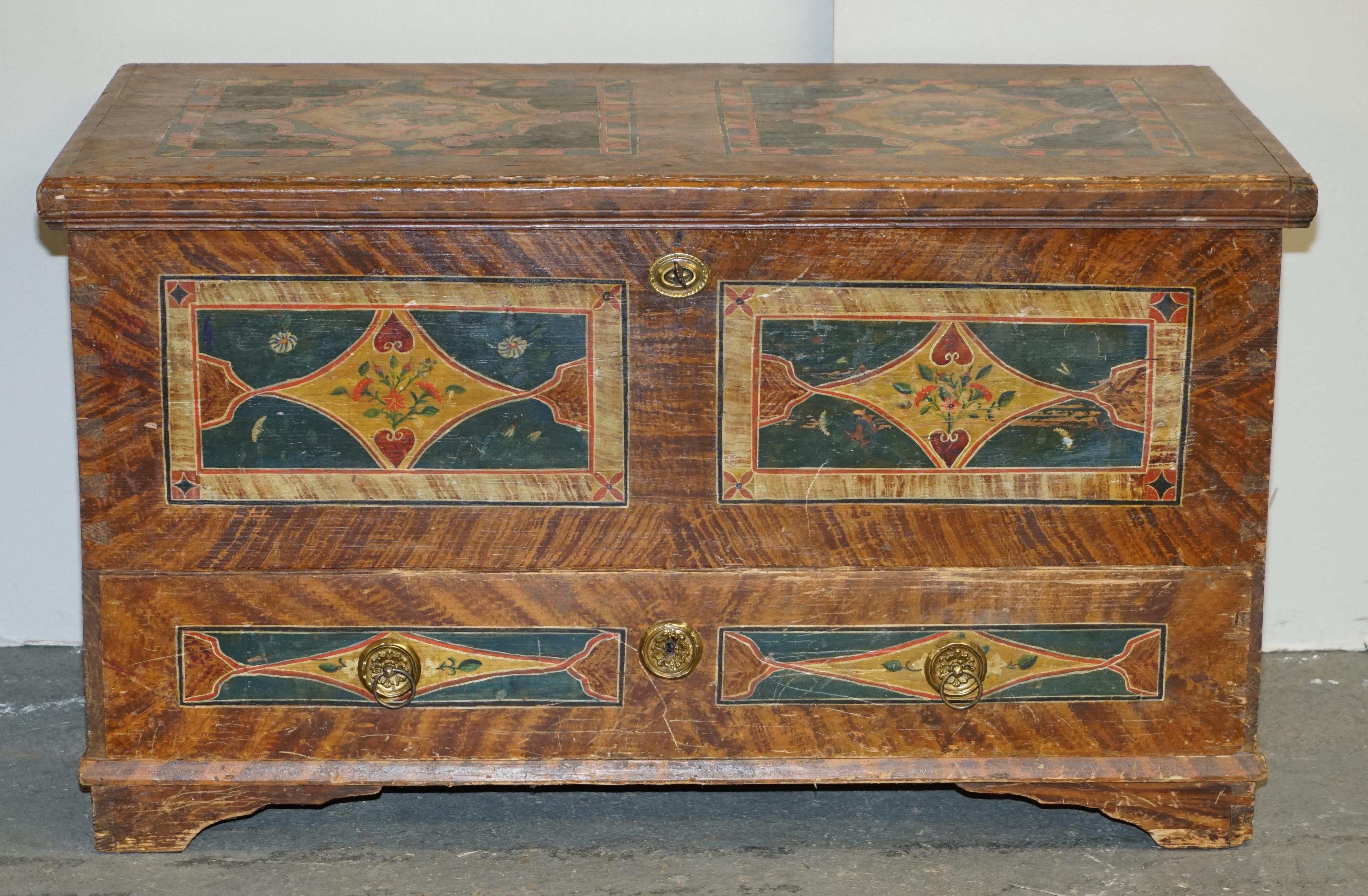 We are delighted to offer for sale this stunning, extra large circa 1875 hand painted Romanian clothes trunk or marriage coffer chest with rare base drawer

I have recently purchased a very large collection of these original, antique painted
