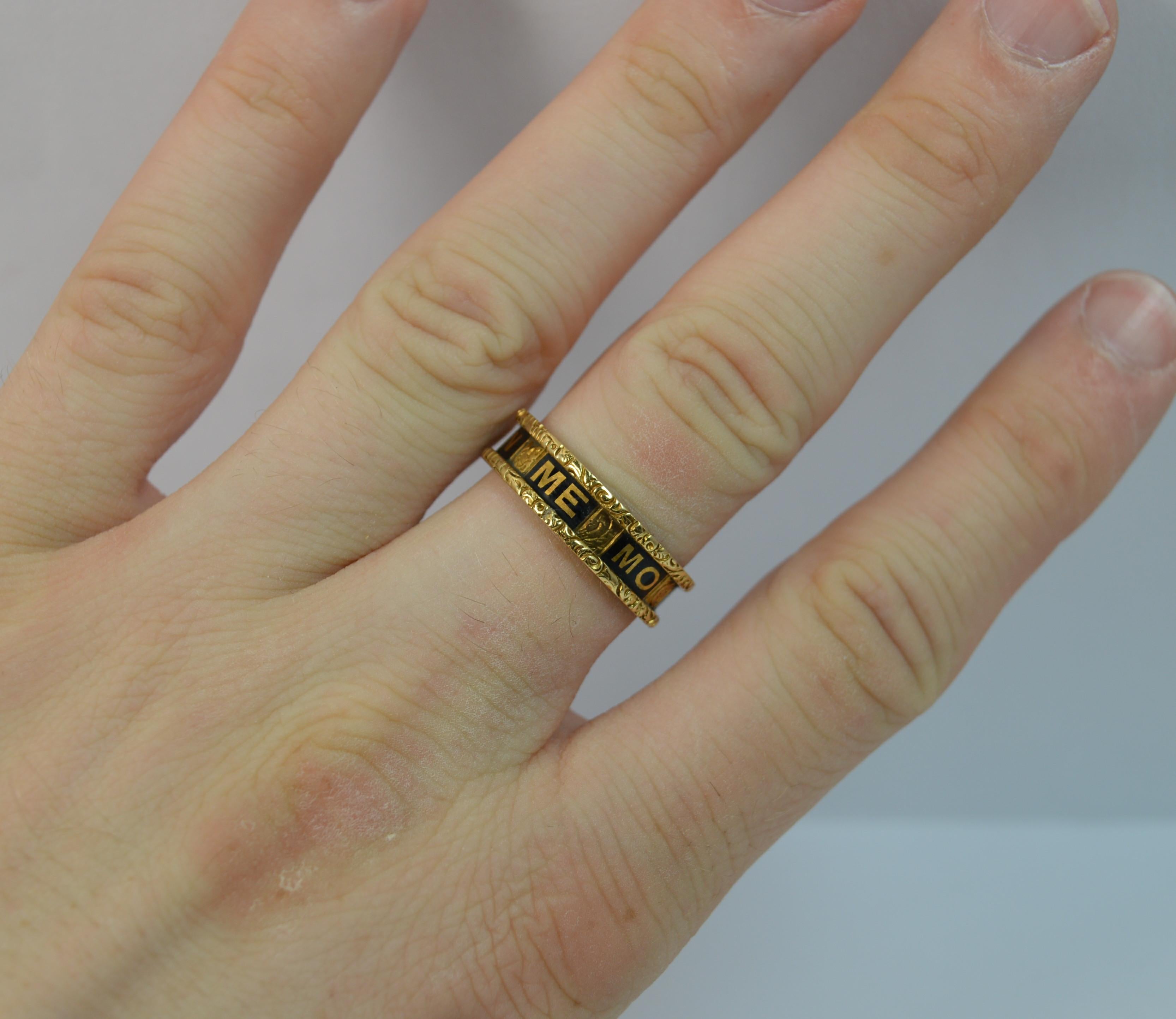 A true mid Victorian period mourning ring.
SIZE ; R 1/2 UK, 8 1/2 US
​The full eternity mourning band to read In Memory Of in black enamelling with a deep floral relief throughout. 

5.6mm wide band throughout. 

​Engraved to the inside of the shank