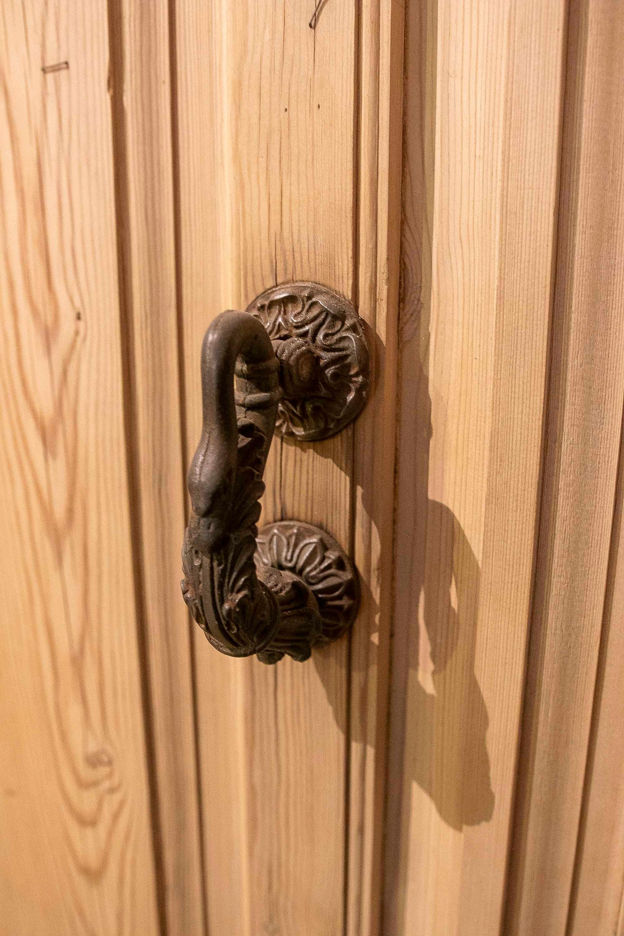 1875s Pair of Antique Wooden Doors with Carved Panels and Iron Knocker For Sale 8