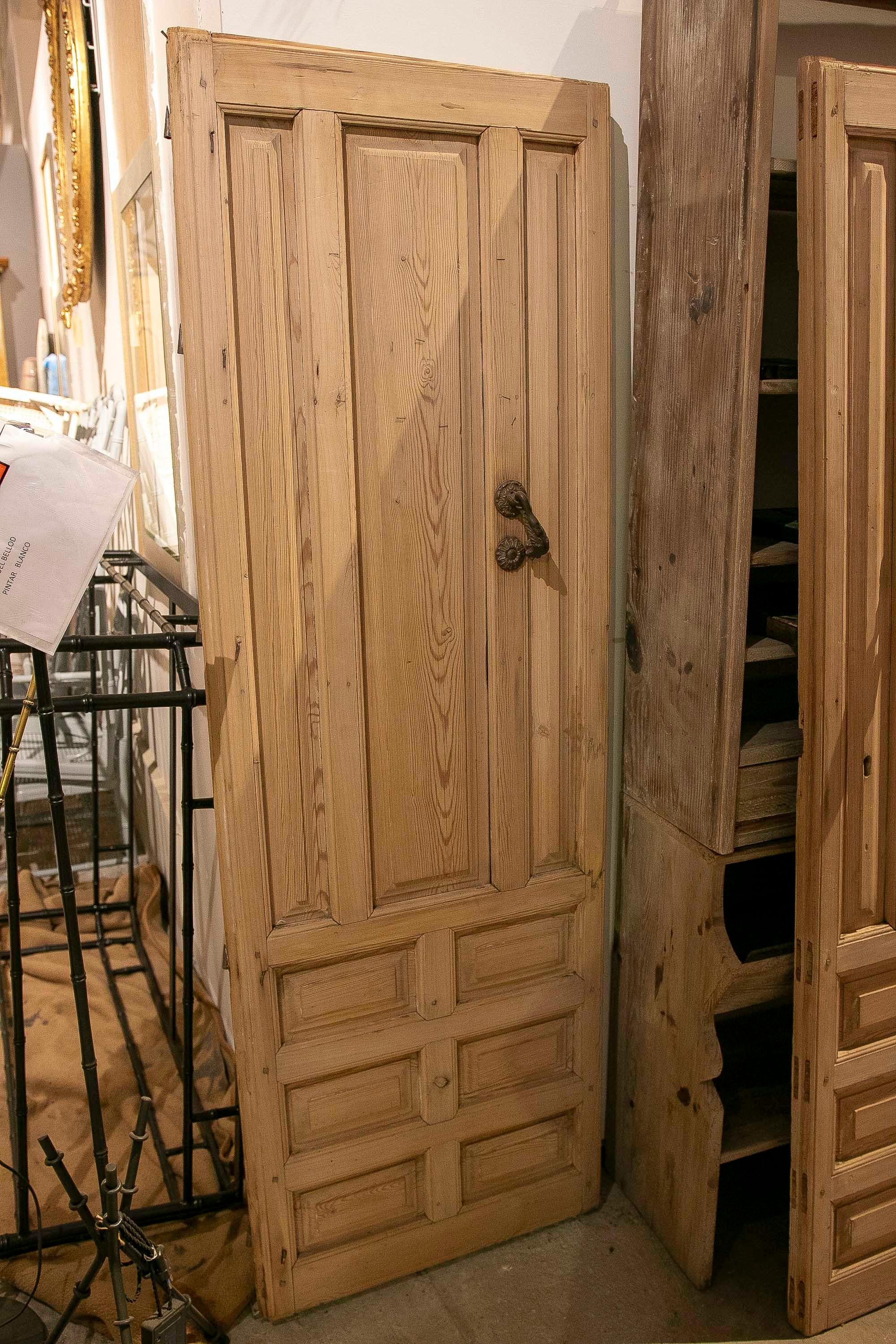 1875s Pair of Antique Wooden Doors with Carved Panels and Iron Knocker For Sale 1