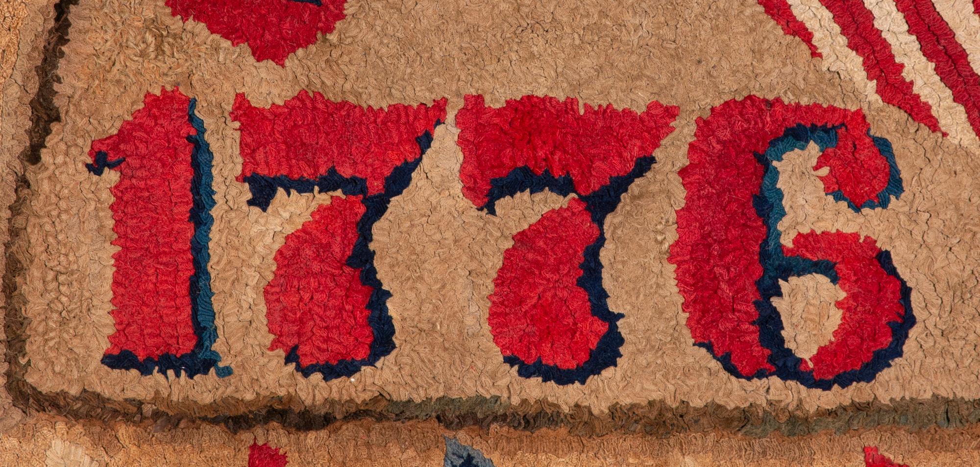 WOOL HOOKED RUG, MADE FOR THE 1876 CENTENNIAL OF AMERICAN INDEPENDENCE, WITH STARS AND A PATRIOTIC SHIELD

Wool hooked rug with a wonderful, patriotic theme, made for the 100th anniversary of American independence. The design centers on a