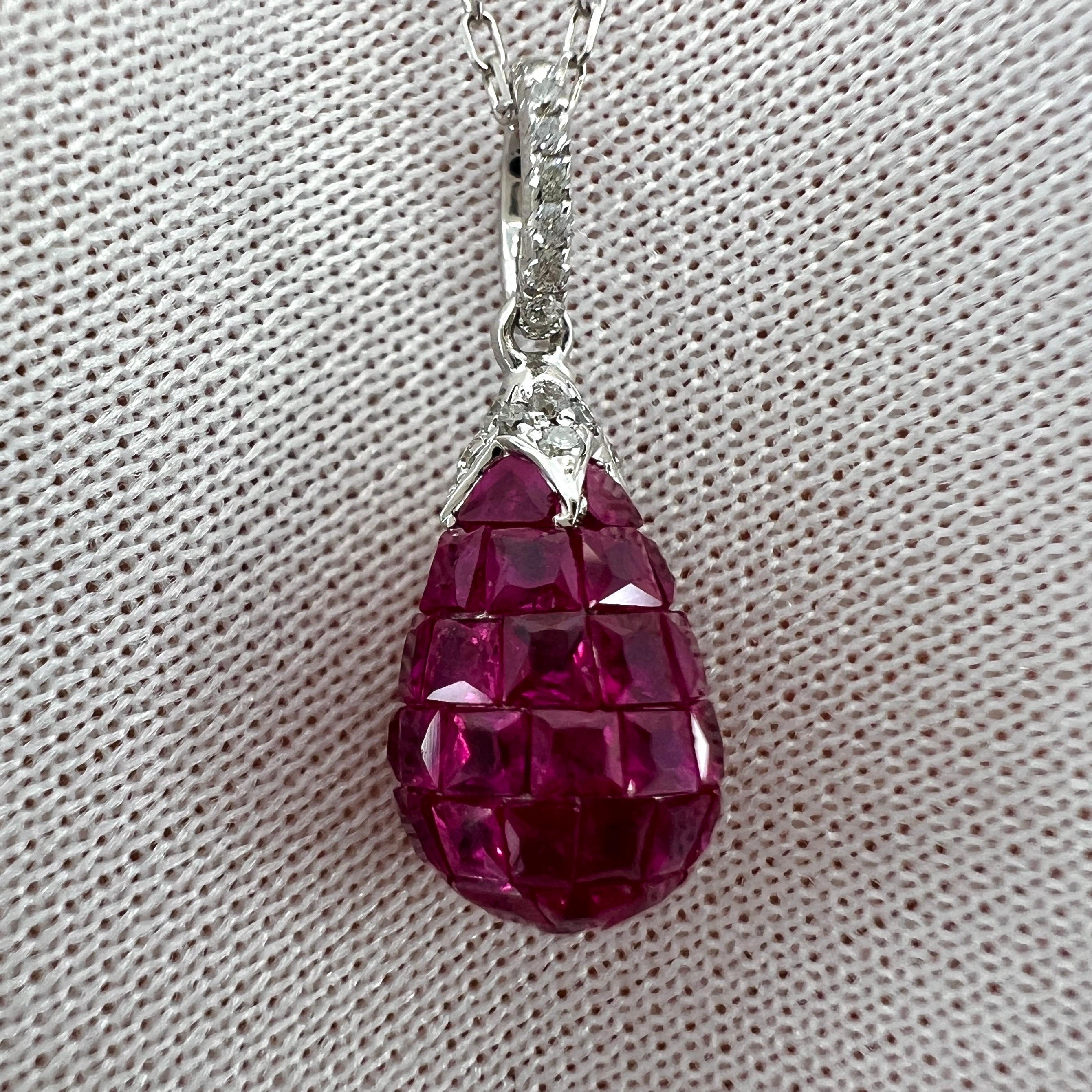 Natural Mystery Ruby & Diamond 18 Karat White Gold Briolette Egg Shape Pendant Necklace.

A stunning shape pendant with beautiful mystery set rubies (a style of setting first developed by French fine jewellery house Van Cleef and Arpels)
These are