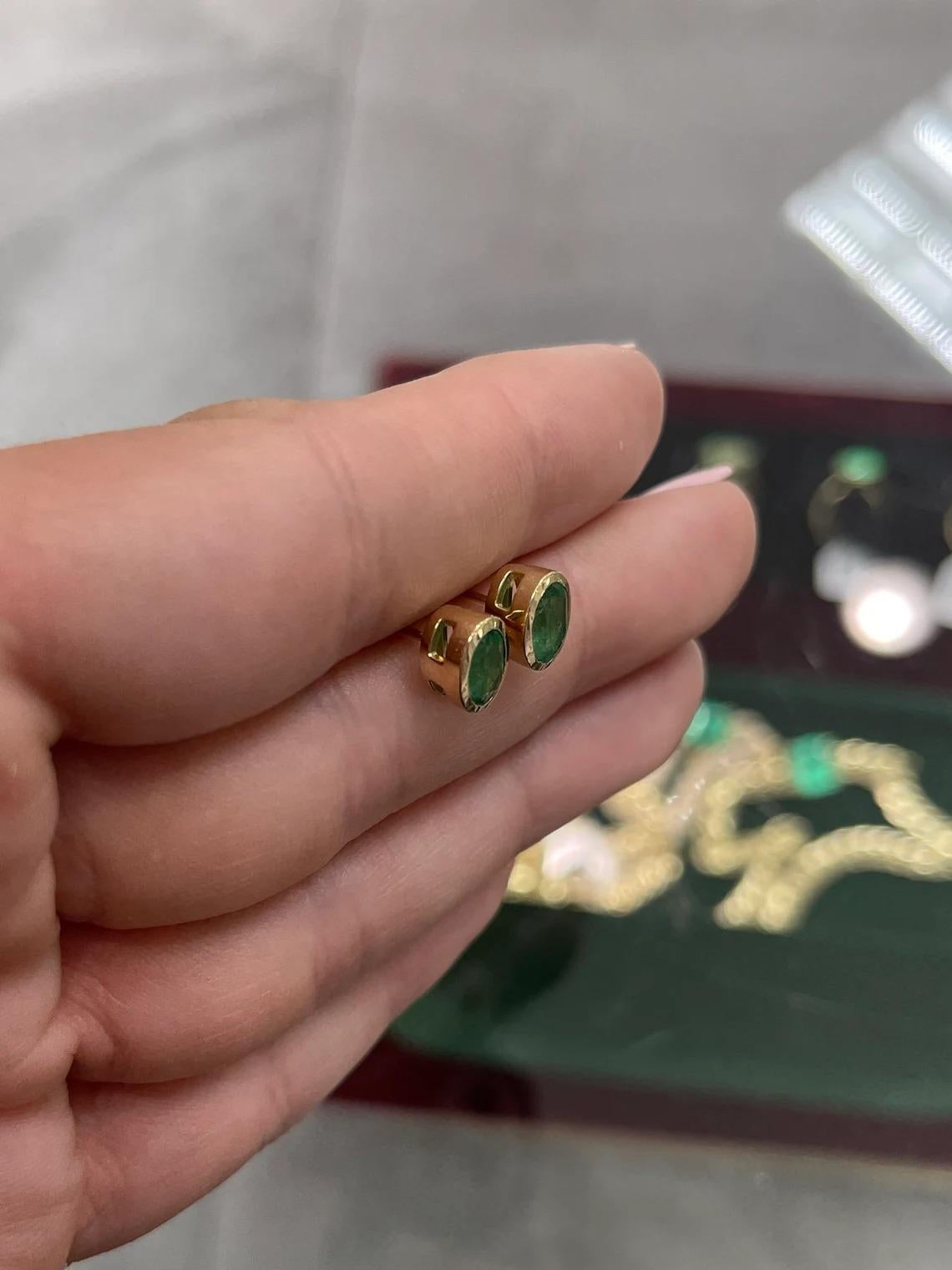 1.87tcw 14K Natural Emerald-Oval Cut Bezel Set Yellow Gold Stud Earrings In New Condition For Sale In Jupiter, FL
