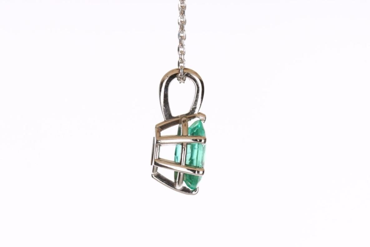 Setting Style: Solitaire - Prong
Setting Material: 14K White Gold
Gold Weight: 1.0 grams

Main Stone: Emerald
Shape: Oval Cut
Approx Weight: 1.88-carats
Color: Green
Clarity: Translucent
Luster: Very Good
Origin: Colombia
Treatment: Natural, Oiling