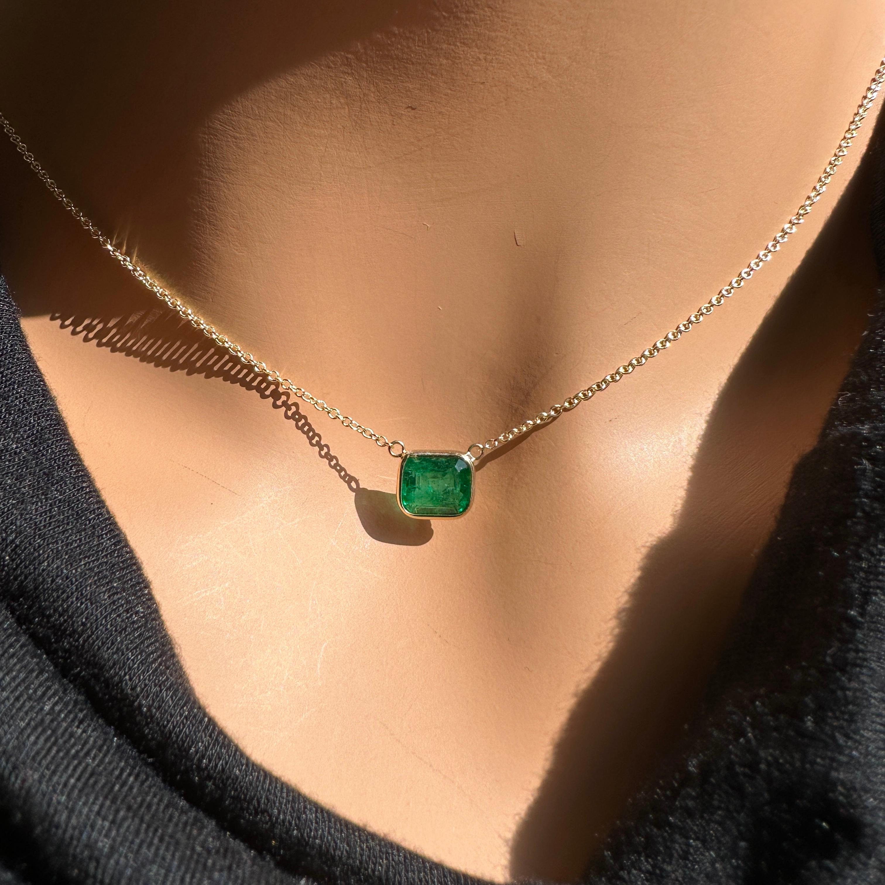 A fashion necklace made of 14k yellow gold with a main stone of an emerald-cut emerald weighing 1.88 carats would be a stunning and elegant choice. Emeralds are known for their rich green color and captivating beauty, and the emerald cut is a