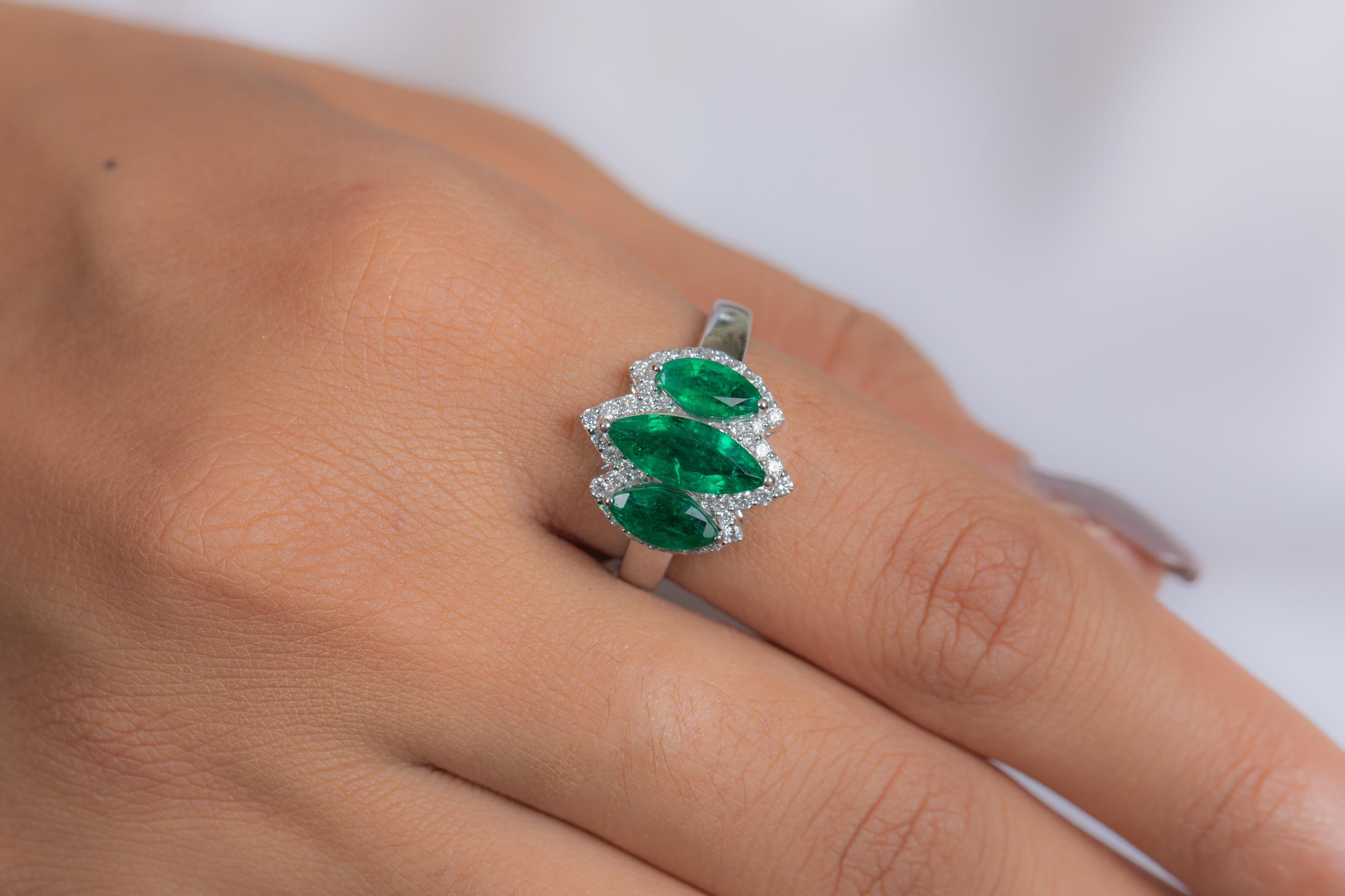 For Sale:  1.88 Carat Emerald Three Stone Ring with Diamonds in 18K White Gold 2