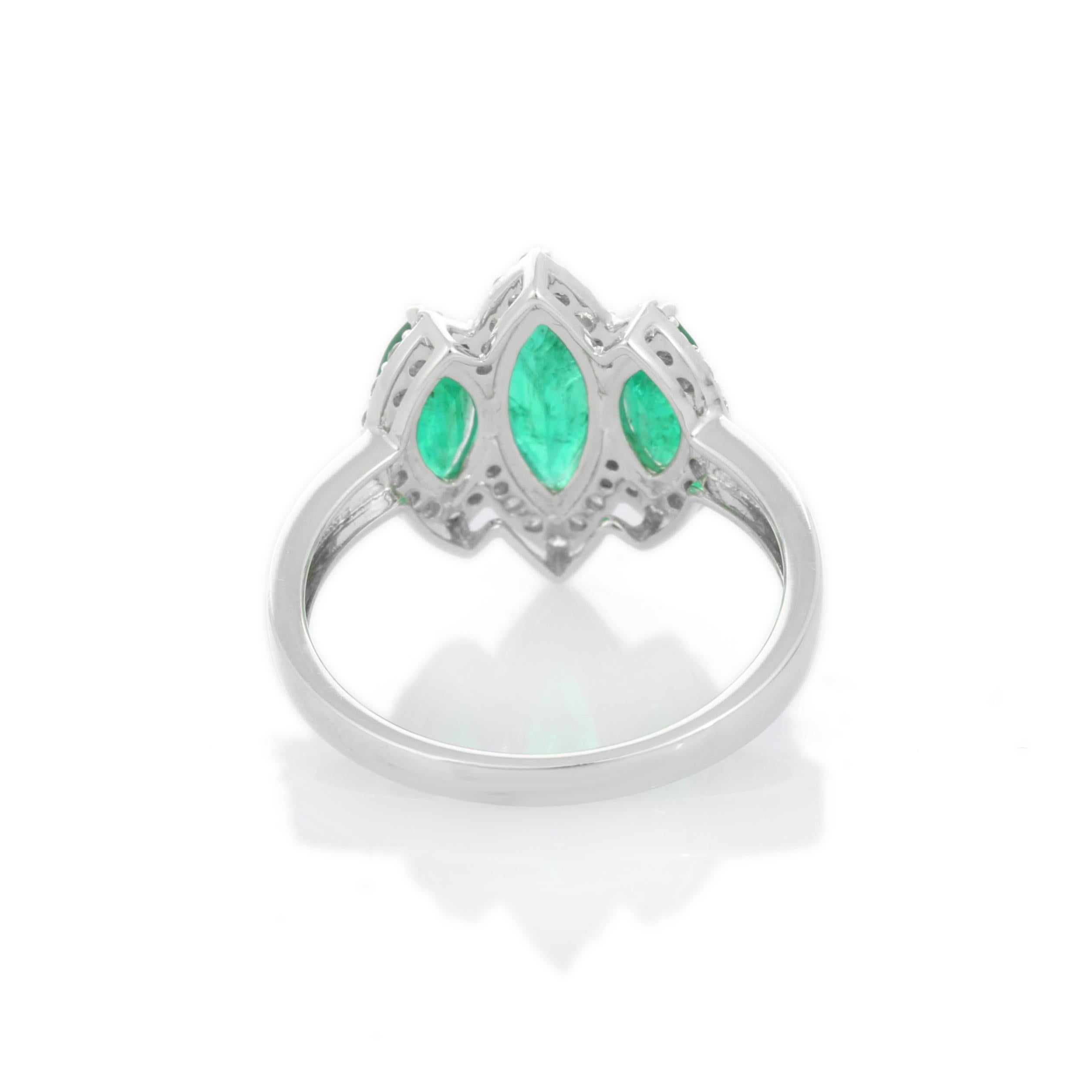For Sale:  1.88 Carat Emerald Three Stone Ring with Diamonds in 18K White Gold 7