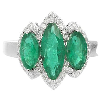 For Sale:  1.88 Carat Emerald Three Stone Ring with Diamonds in 18K White Gold