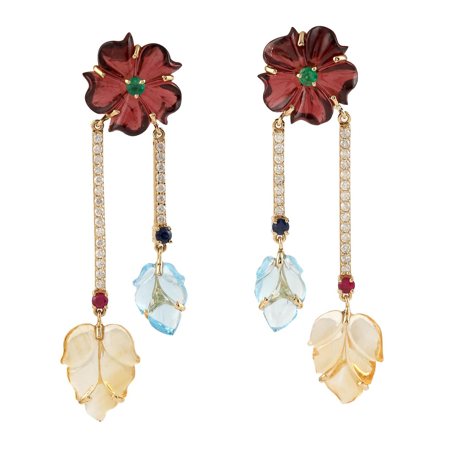 Cast in 14-karat gold. These beautiful earrings are set with 18.8 carats of carved multi gemstone, emerald, topaz, ruby and .37 carats of sparkling diamonds.  See other flower collection matching pieces.

FOLLOW  MEGHNA JEWELS storefront to view the