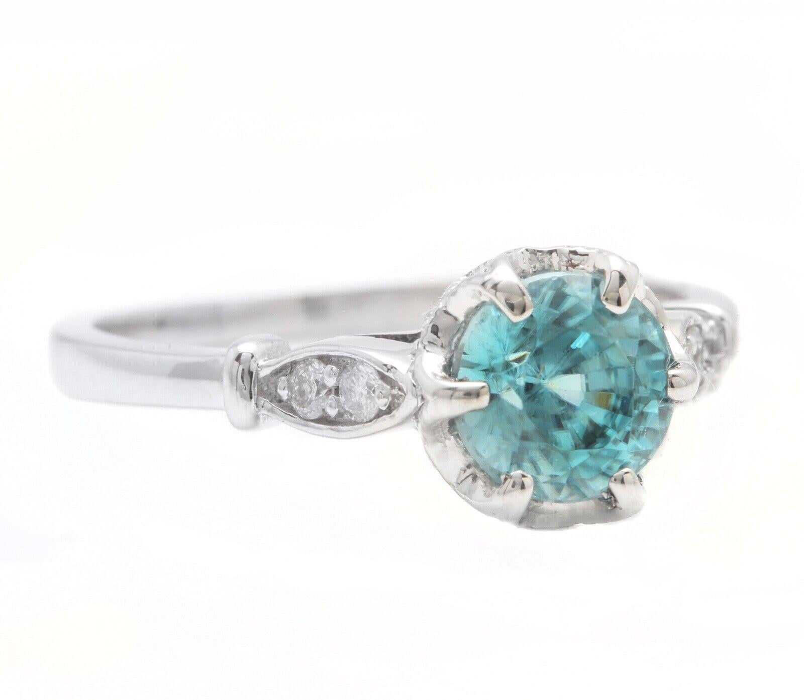 1.88 Carats Natural Very Nice Looking Zircon and Diamond 14K Solid White Gold Ring

Suggested Replacement Value:  Approx. $3,000.00

Total Natural Round Zircon Weight is: Approx. 1.80 Carats 

Zircon Measures: Approx. 6.20mm

Natural Round Diamonds