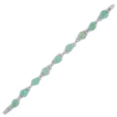 Bracciale con smeraldo grezzo intagliato da 18,8 carati in oro bianco 18 carati e diamanti