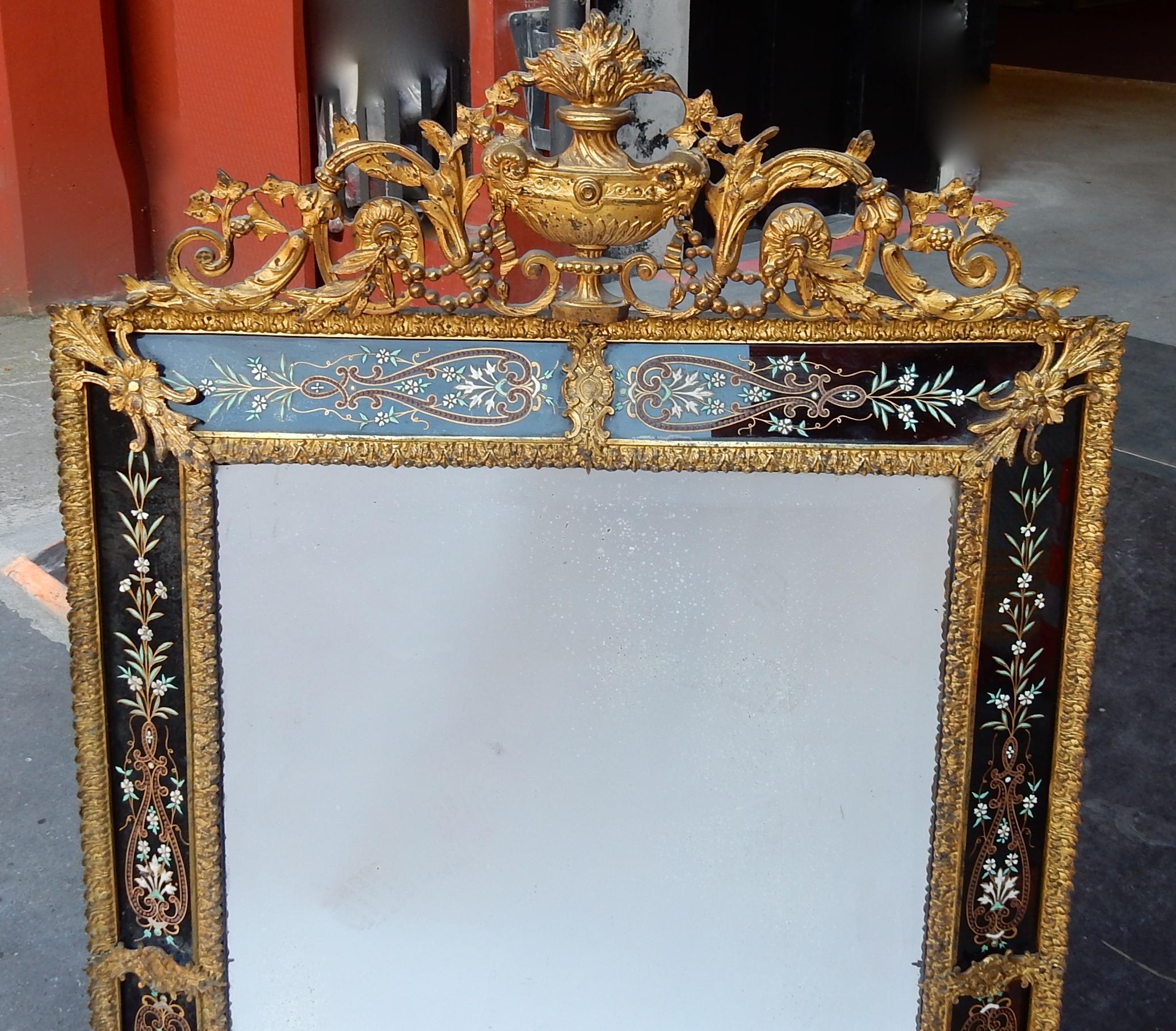 Venice rectangular, gilded bronze, mirror black color silvering emailed with flowers, the centre is beveled, some small spots, good condition, height without pediment 93 cm, circa 1880-1900.