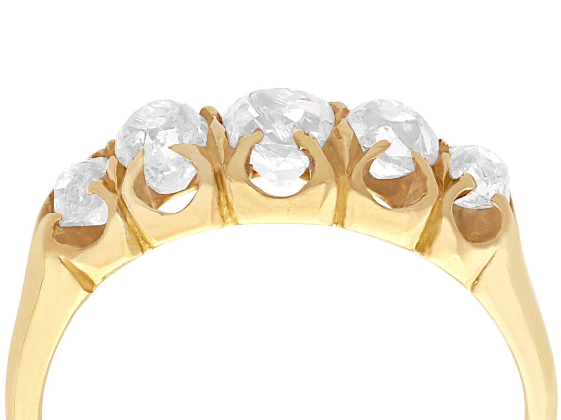 A fine and impressive antique Victorian 0.78 carat diamond and 18 karat yellow gold, five stone ring; part of our antique jewelry and estate jewelry collections.

This fine and impressive Victorian diamond ring has been crafted in 18k yellow