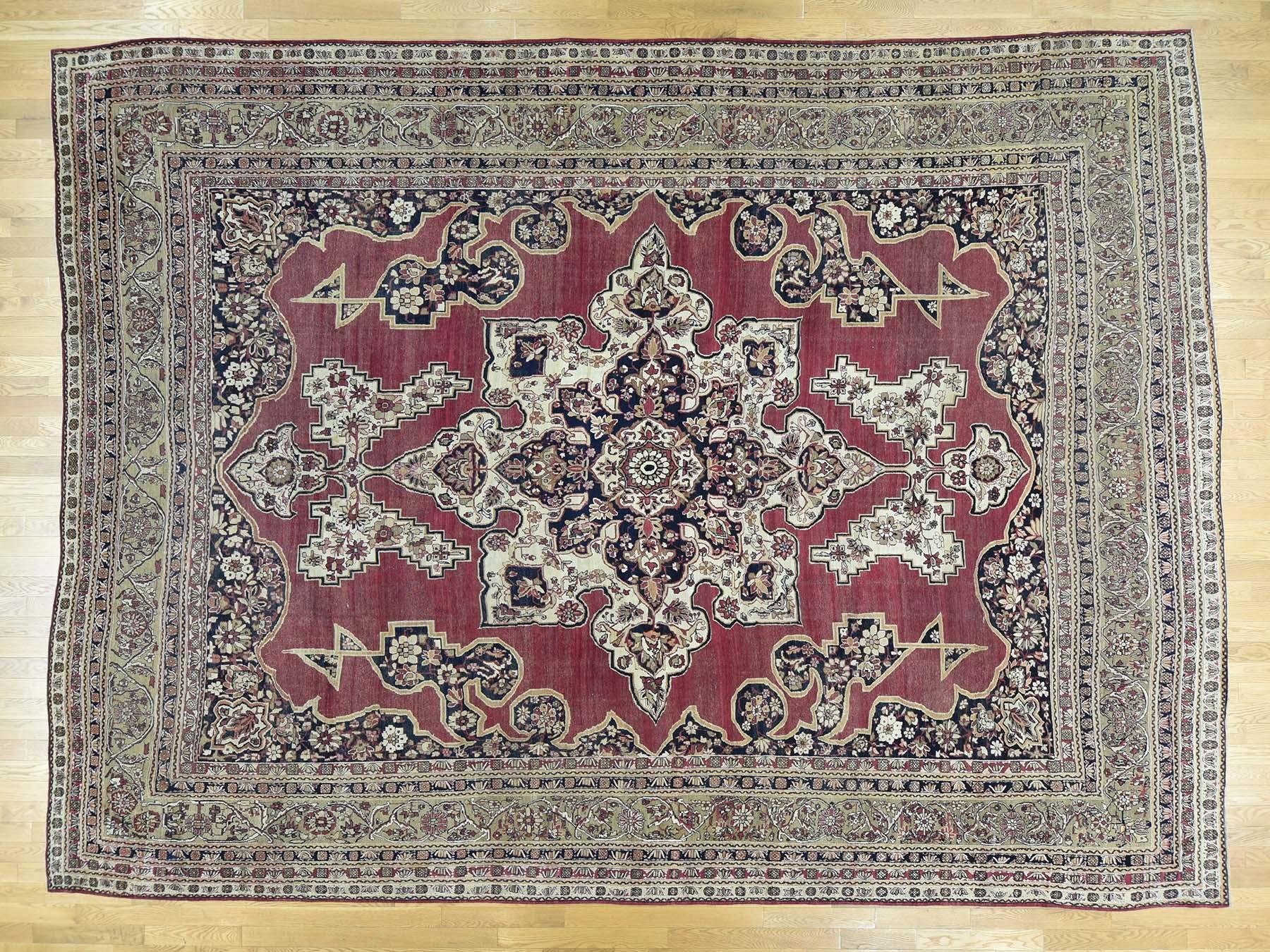 This is a Genuine hand knotted Oriental rug. It is not hand tufted or machine made rug. Our entire inventory is made of either hand knotted or handwoven Rugs.

Remodel your home with this stunning antique carpet. This handcrafted Persian Lavar