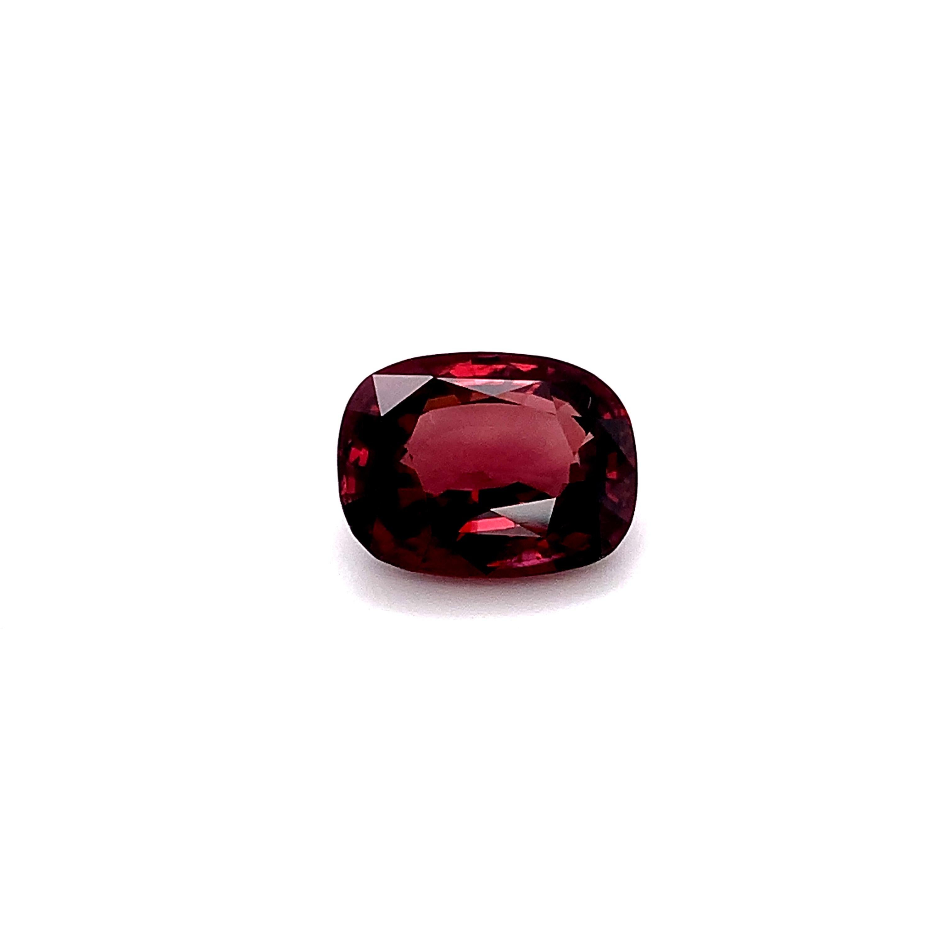 This unusually large zircon has a beautiful rose red color and exceptional clarity! While zircon is generally recognized for its bright blue variety, this December birthstone occurs in a rainbow of colors, including brilliant reds! Weighing 18.80