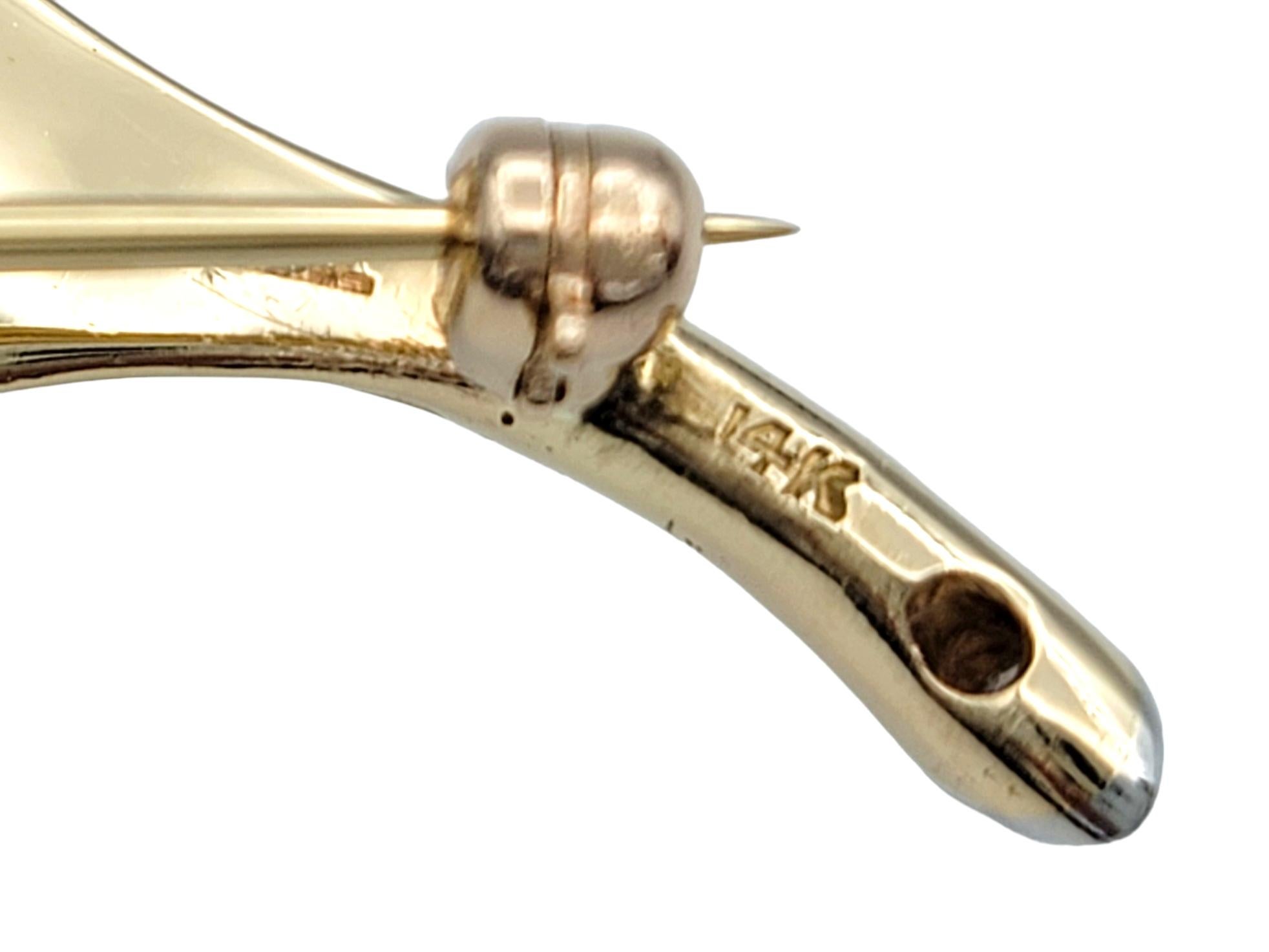 Women's 18.80 Carat Yellow Sapphire Feather Brooch with Diamonds in 14 Karat Rose Gold For Sale