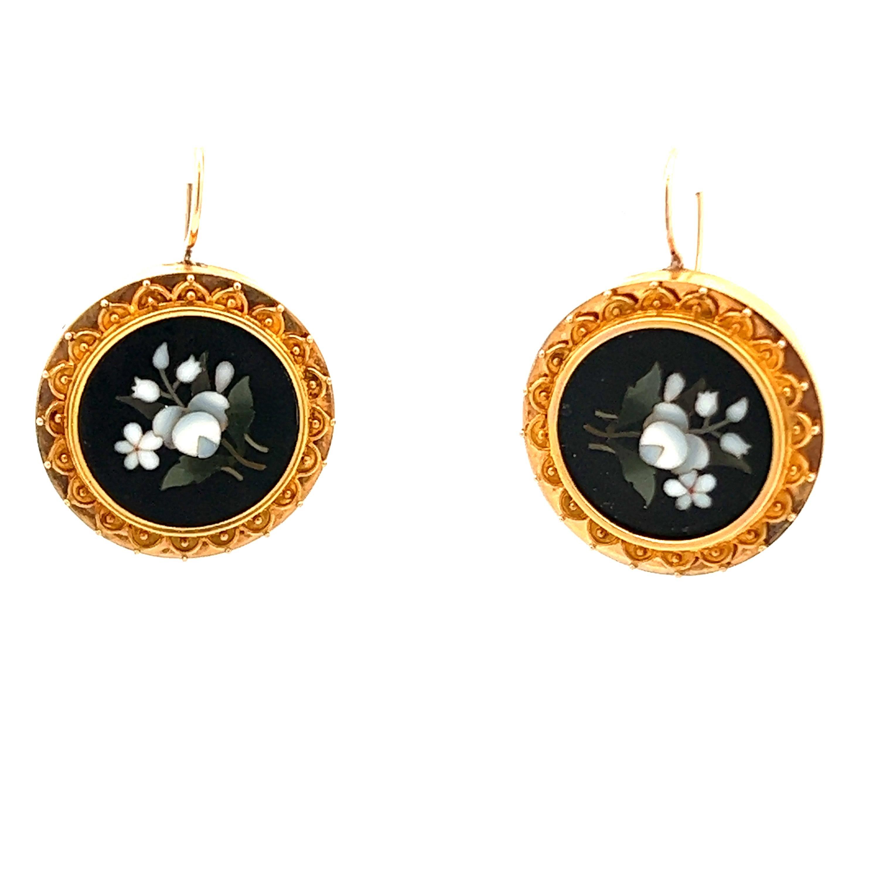 This beautiful pair of Pietra Dura Etruscan earrings from 1880 are made in 18k yellow gold with shepherd hooks. These earrings are quite unique due to their time period and materials. Being made in 18k yellow gold, these earrings contain a higher