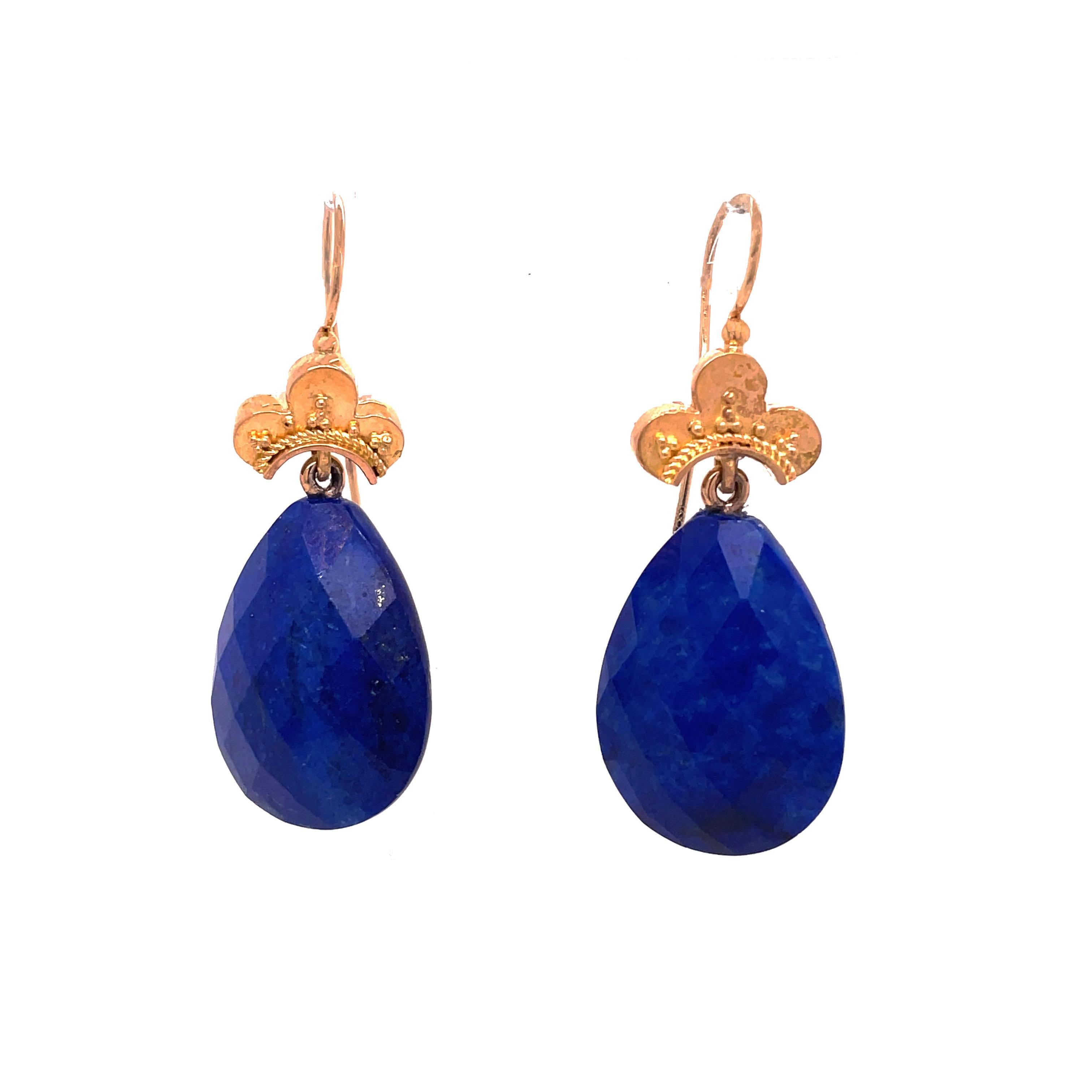 This is a stunning pair of striking blue lapis lazuli Etruscan drop earrings set in a warm 18K yellow gold. The color of the lapis lazuli drops is out of this world, a beautiful rich blue color with golden flakes of color shimmering like stars! The