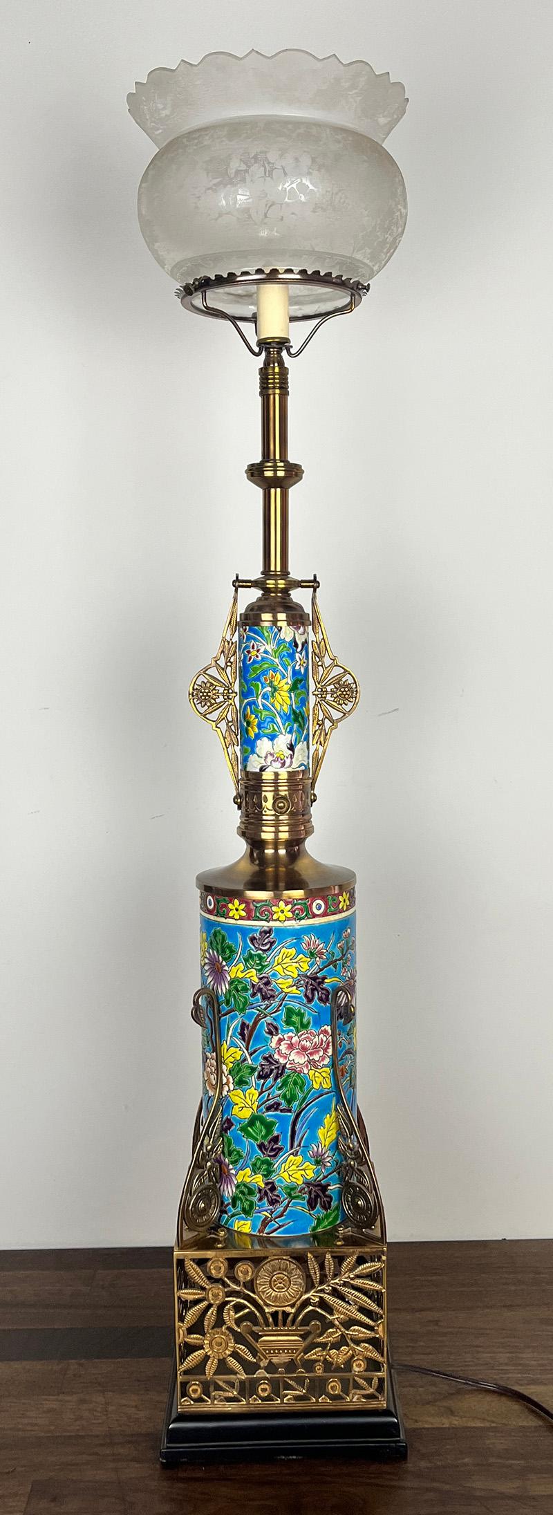 Stunning original 1880s converted gas newel post. This is the largest we have ever had in over 40 years as an antique lighting dealer. Original porcelain inserts are attributed to Longwy base on the pattern and cloisonne technique. Colours are