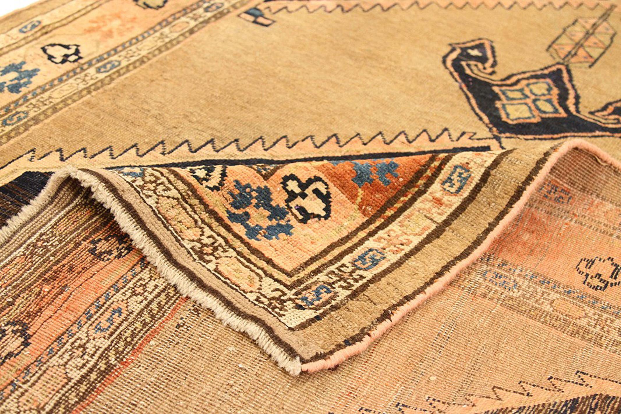 Antique Persian runner rug handwoven from the finest sheep’s wool and colored with all-natural vegetable dyes that are safe for humans and pets. It’s a traditional Bijar design featuring large medallions in black and beige over the center field.
