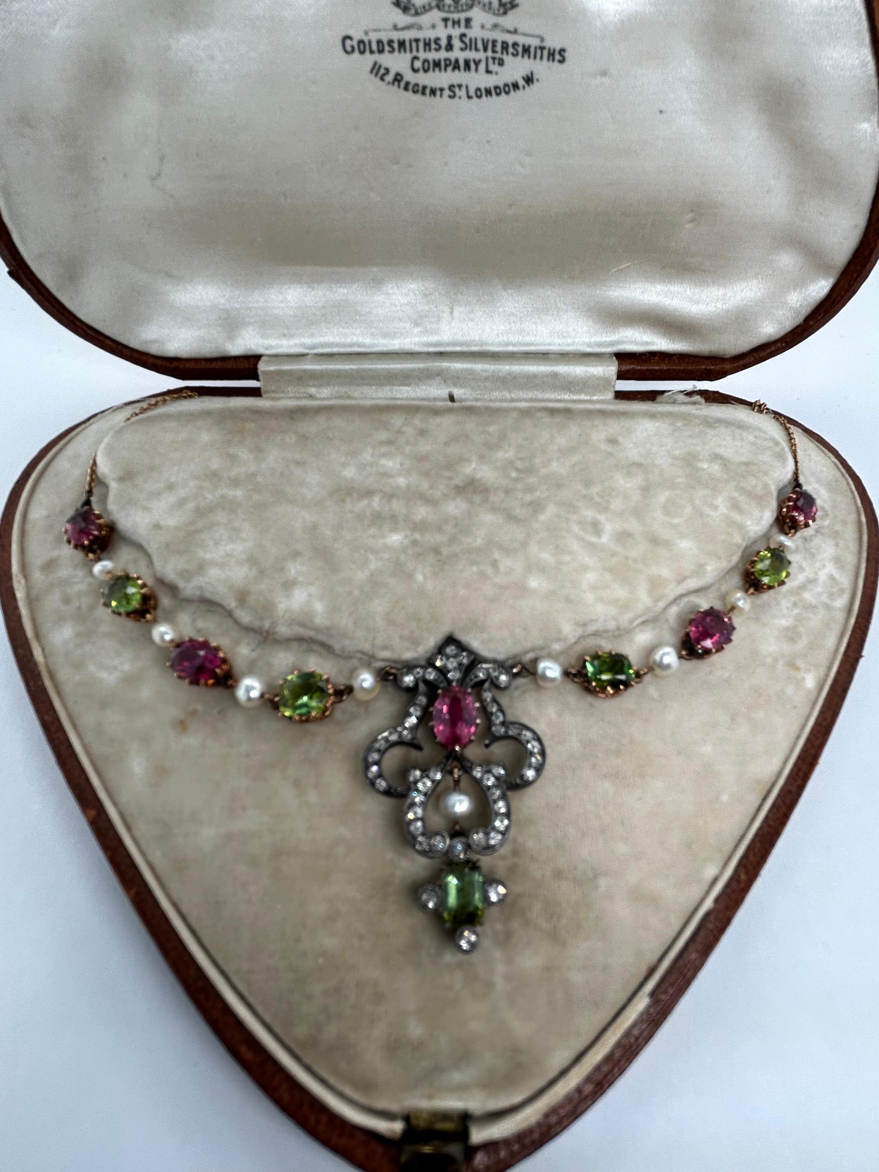 Beautiful Antique 1880s Silver Gold Pink Tourmaline, Peridot Diamond Seed Pearl Necklace with original box, possible English, 10 colored stones, approx 12 carat colored stones, 1/2 carat diamond