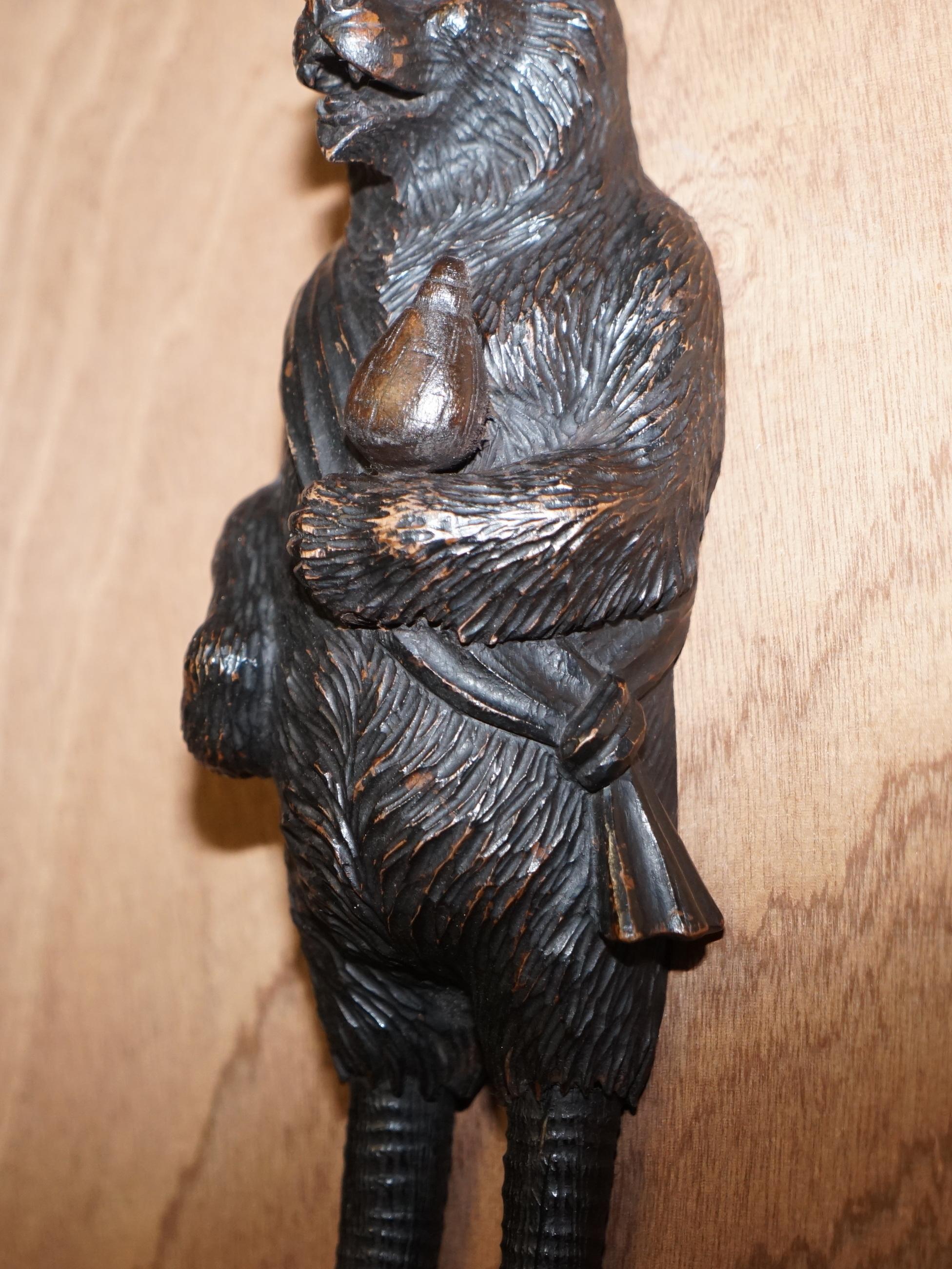 Late 19th Century 1880 Very Rare Medium Swiss Black Forest Bear with Bottle Whip Hook Hand Carved
