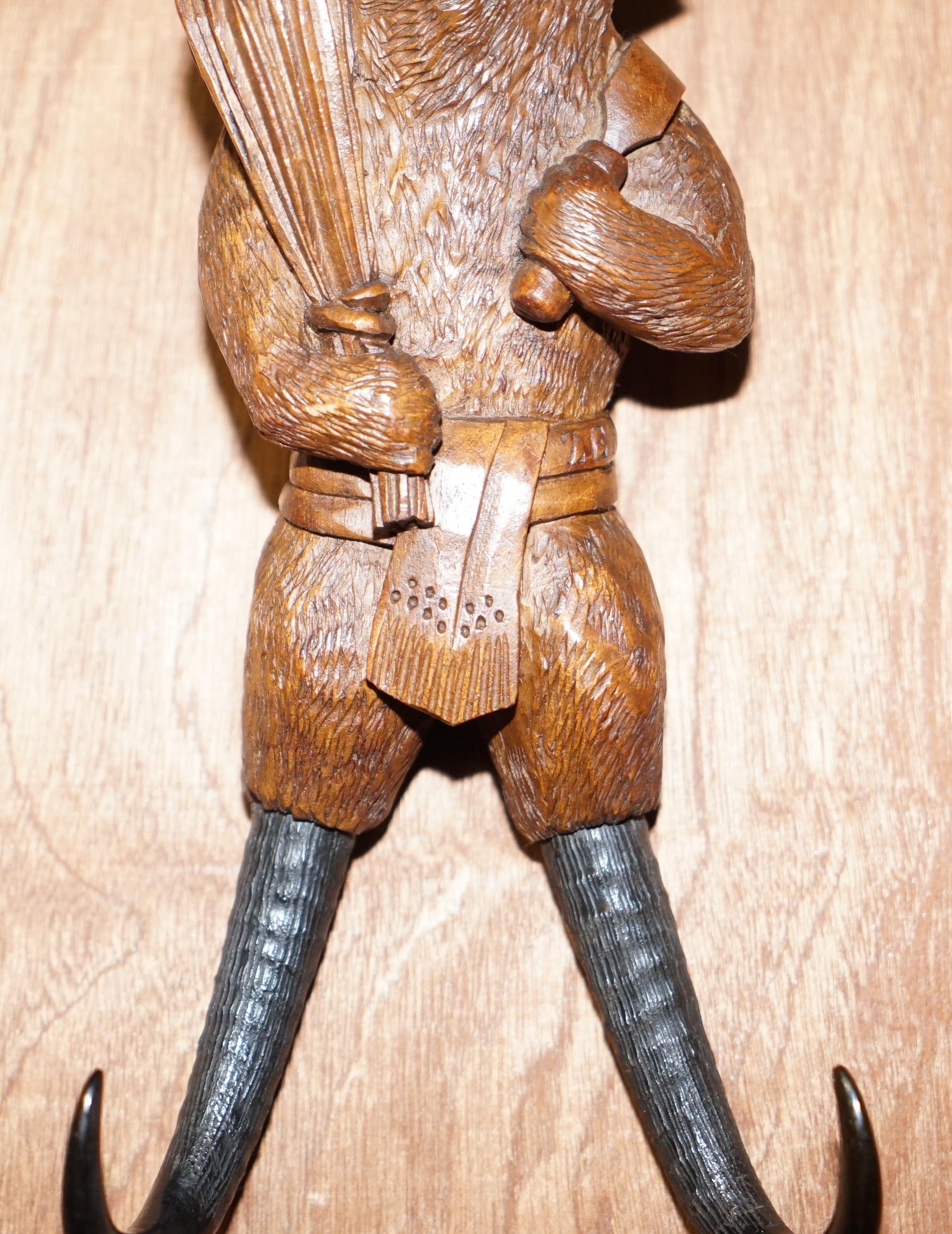 Late 19th Century 1880 Very Rare Medium Swiss Black Forest Bear with Hat Whip Hook Hand Carved