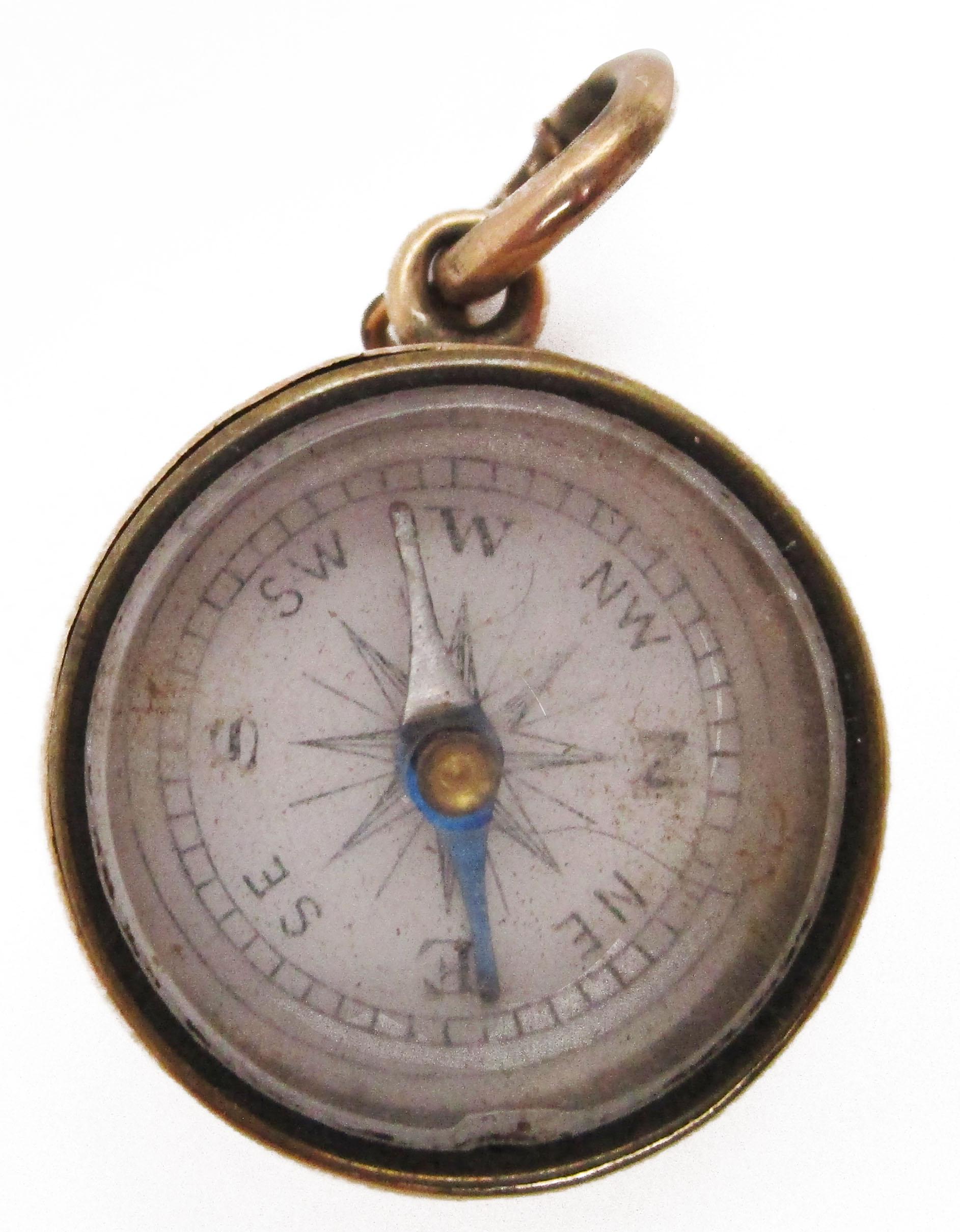 This incredible Victorian watch fob dates back to 1880 and is a stunning 14k rose gold compass! The aged metal is in excellent shape and has a unique finish that only comes with antique jewelry. The compass itself is still in great working