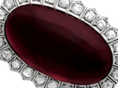 33.8t8 Carat Garnet and 1.92 Carat Diamond Brooch in Yellow Gold