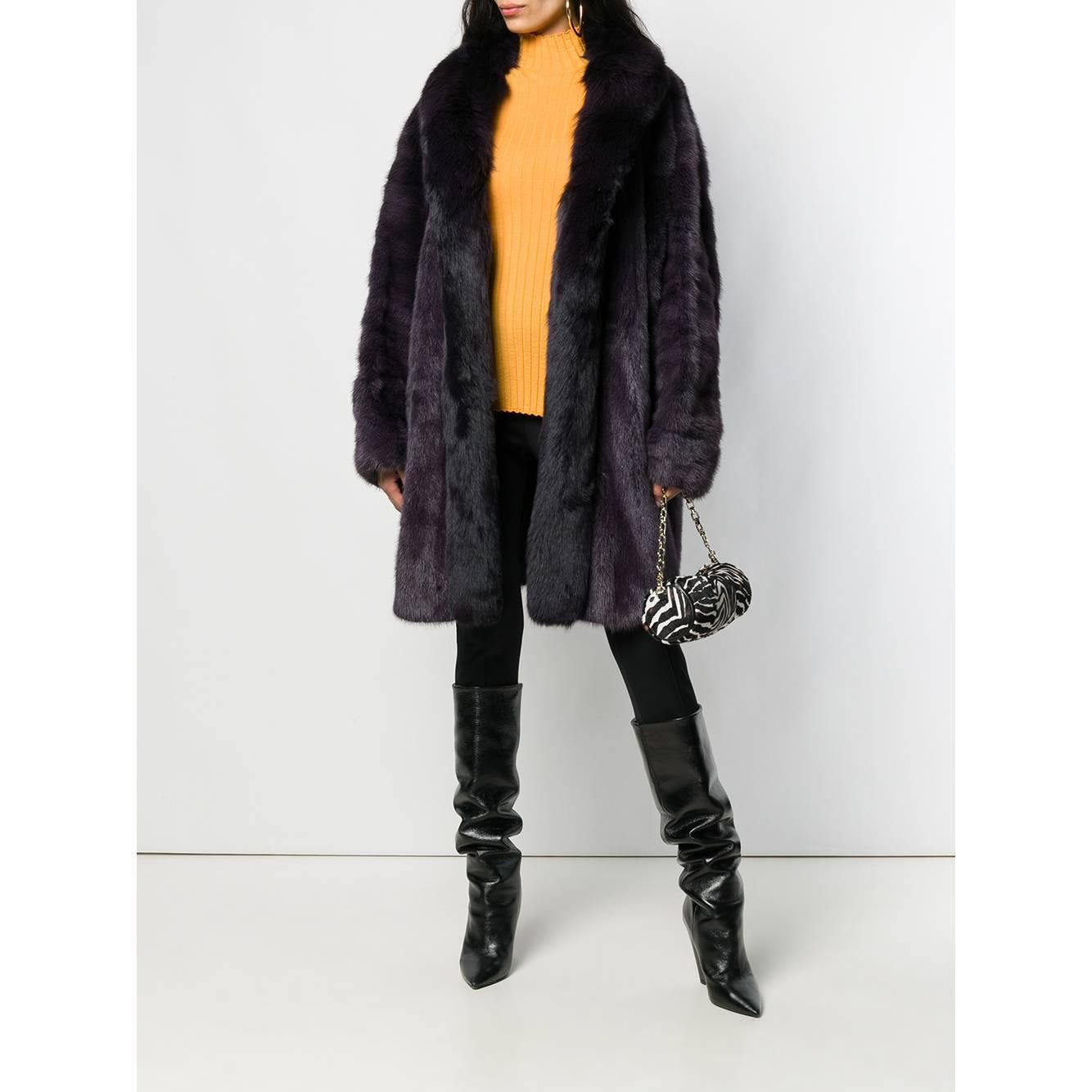 A.N.G.E.L.O. Vintage - ITALY
A.N.G.E.L.O. Vintage Cult purple mink and fox fur coat. V-shaped shawl collar, front closure with hooks. Long sleeves and front welt pockets.

Please note, this item cannot be shipped outside the European Union.

Years: