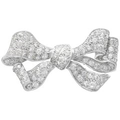 1880s Antique 4.82 Carat Diamond and White Gold Bow Brooch