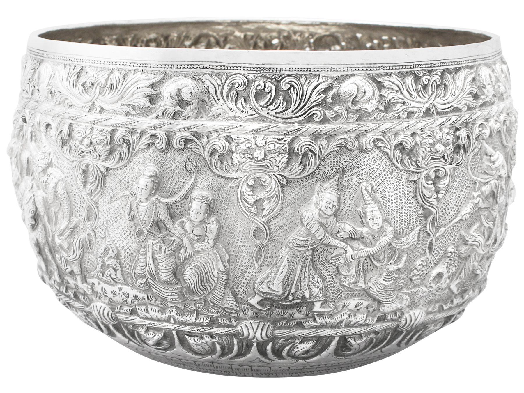 An exceptional fine and impressive, large antique Burmese silver thabeik bowl; an addition to our ornamental silverware collection.

This exceptional antique Burmese thabeik silver bowl has a circular rounded form.

The surface of the bowl is