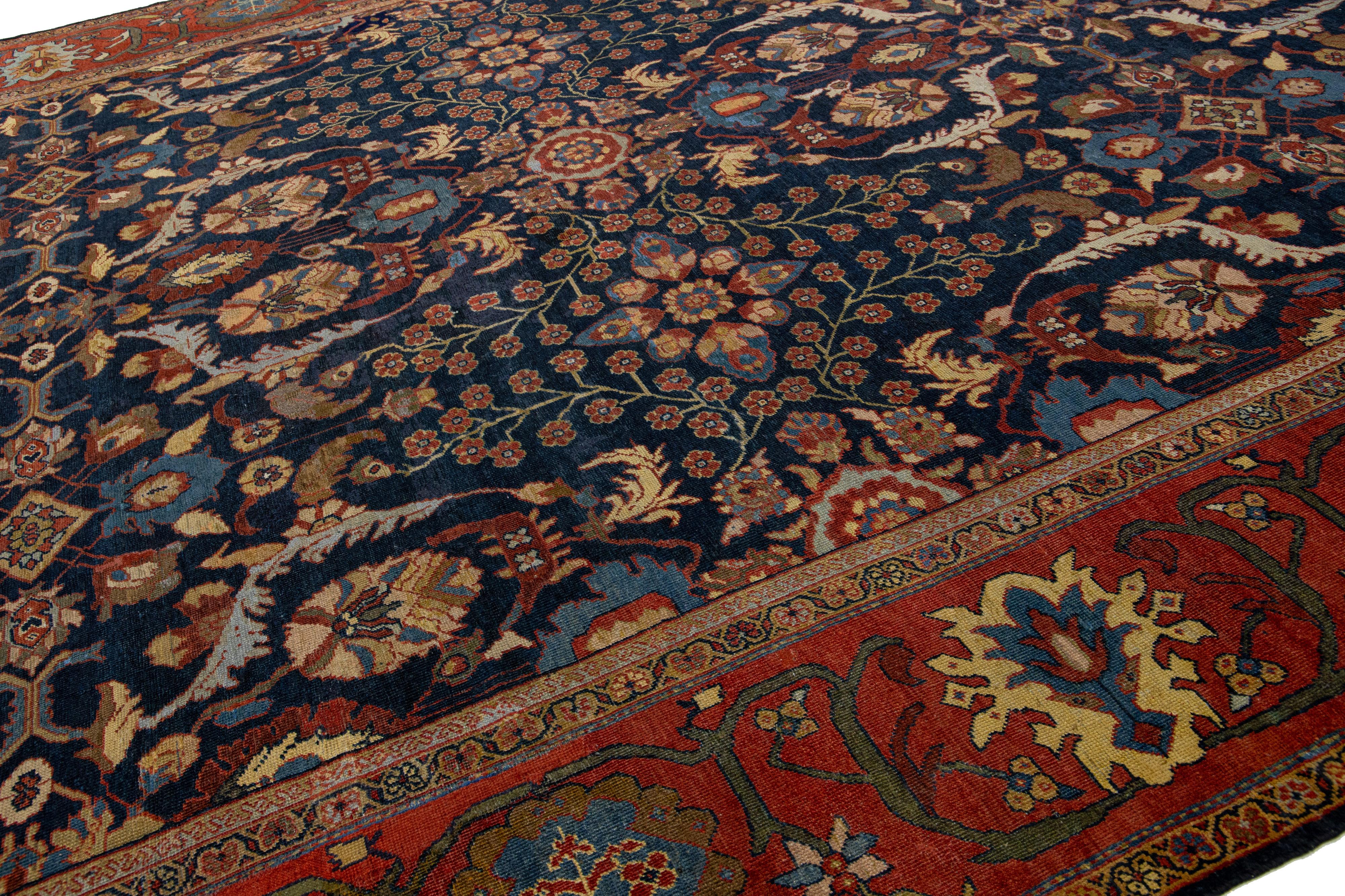 Tapis persan Sultanabad à fleurs anciennes des années 1880 en laine bleu foncé Bon état - En vente à Norwalk, CT