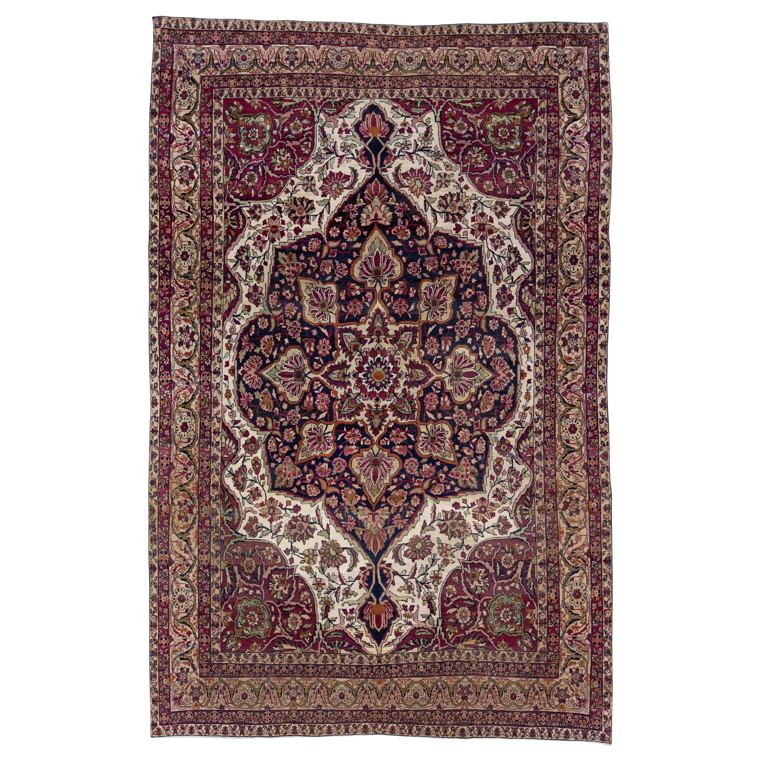 Tapis persan antique Kerman fait à la main des années 1880 avec motif de médaillon multicolore en vente