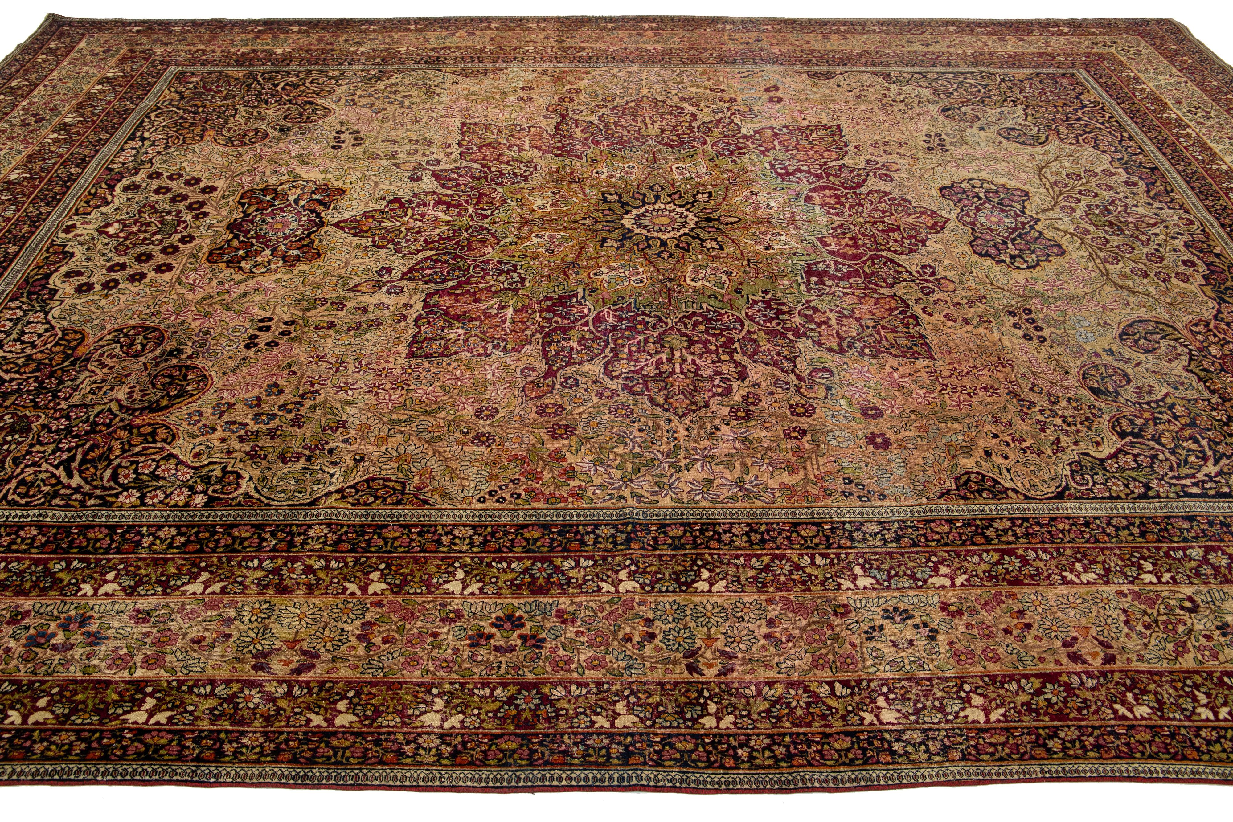 1880s Antique Persian Kerman Red Wool Rug Handmade Featuring a Rosette Motif  In Good Condition For Sale In Norwalk, CT