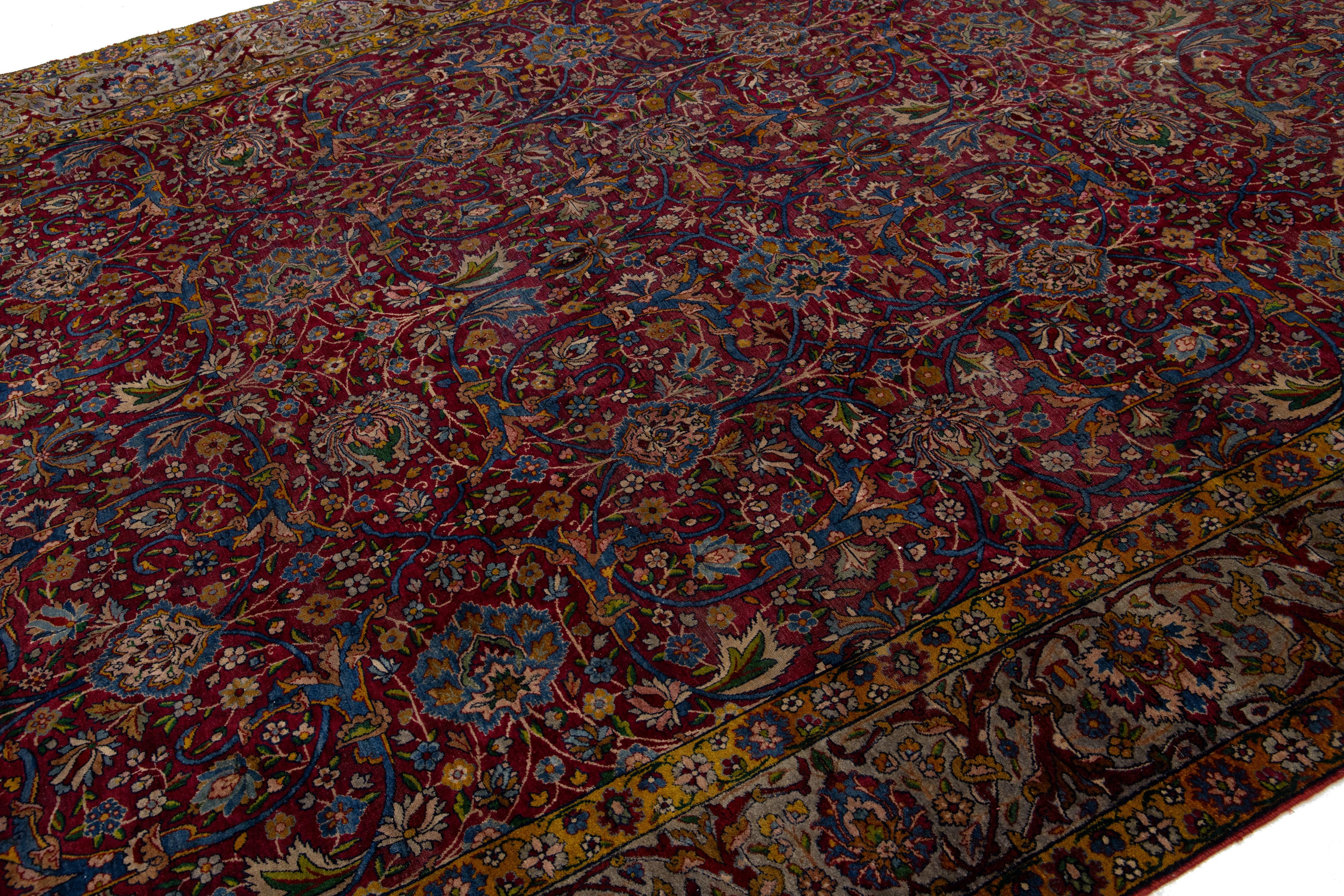 Annodato a mano Tappeto antico in lana persiana Tabriz del 1880 con classico disegno floreale in rosso in vendita