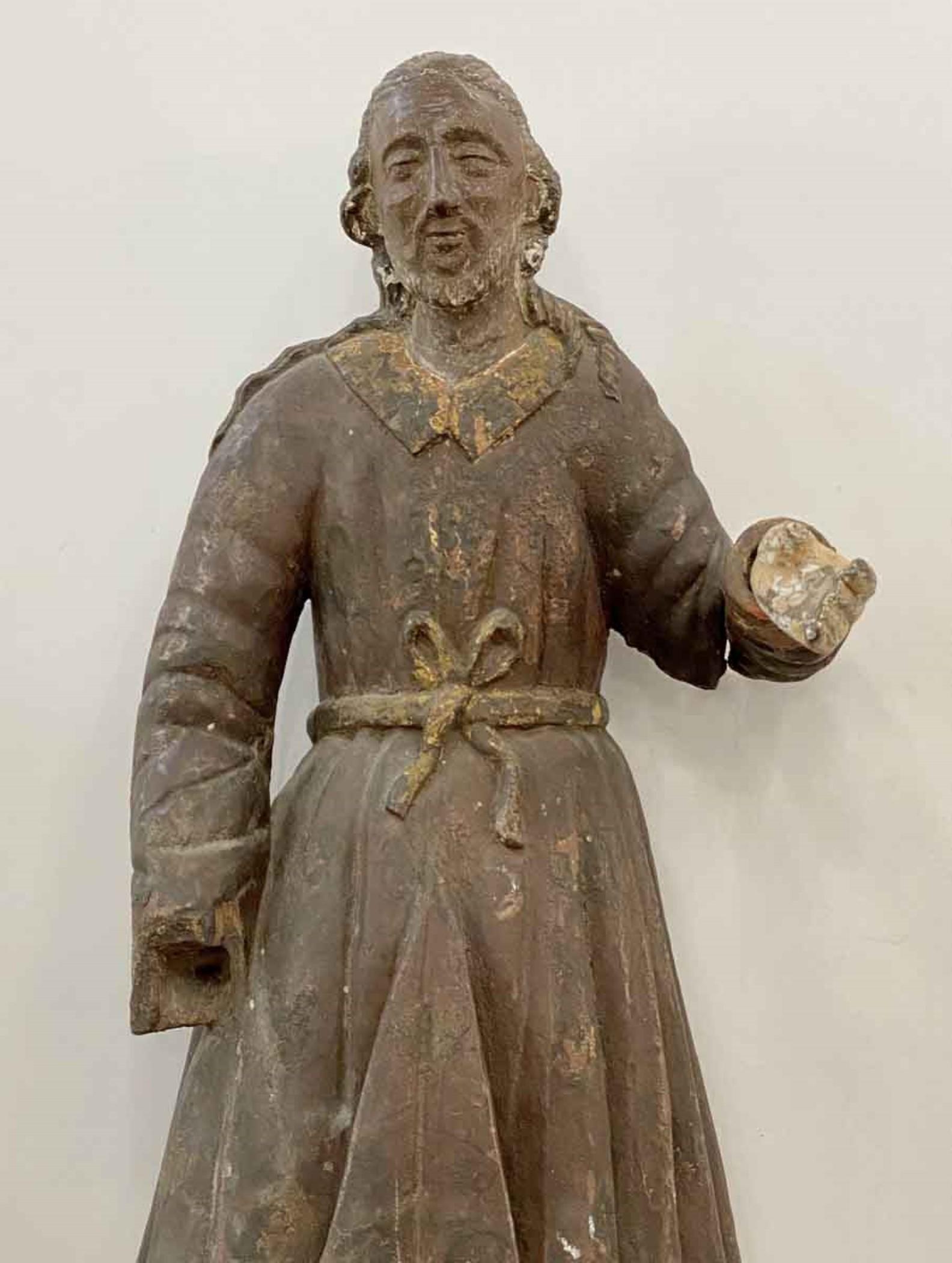 San Isidro was a Madrid born Catholic farmworker known for his piety toward the poor and animals. Antique hand carved wood statue of San Isidro with the original paint. Some damage as shown in the pictures. This can be seen at our 333 West 52nd St