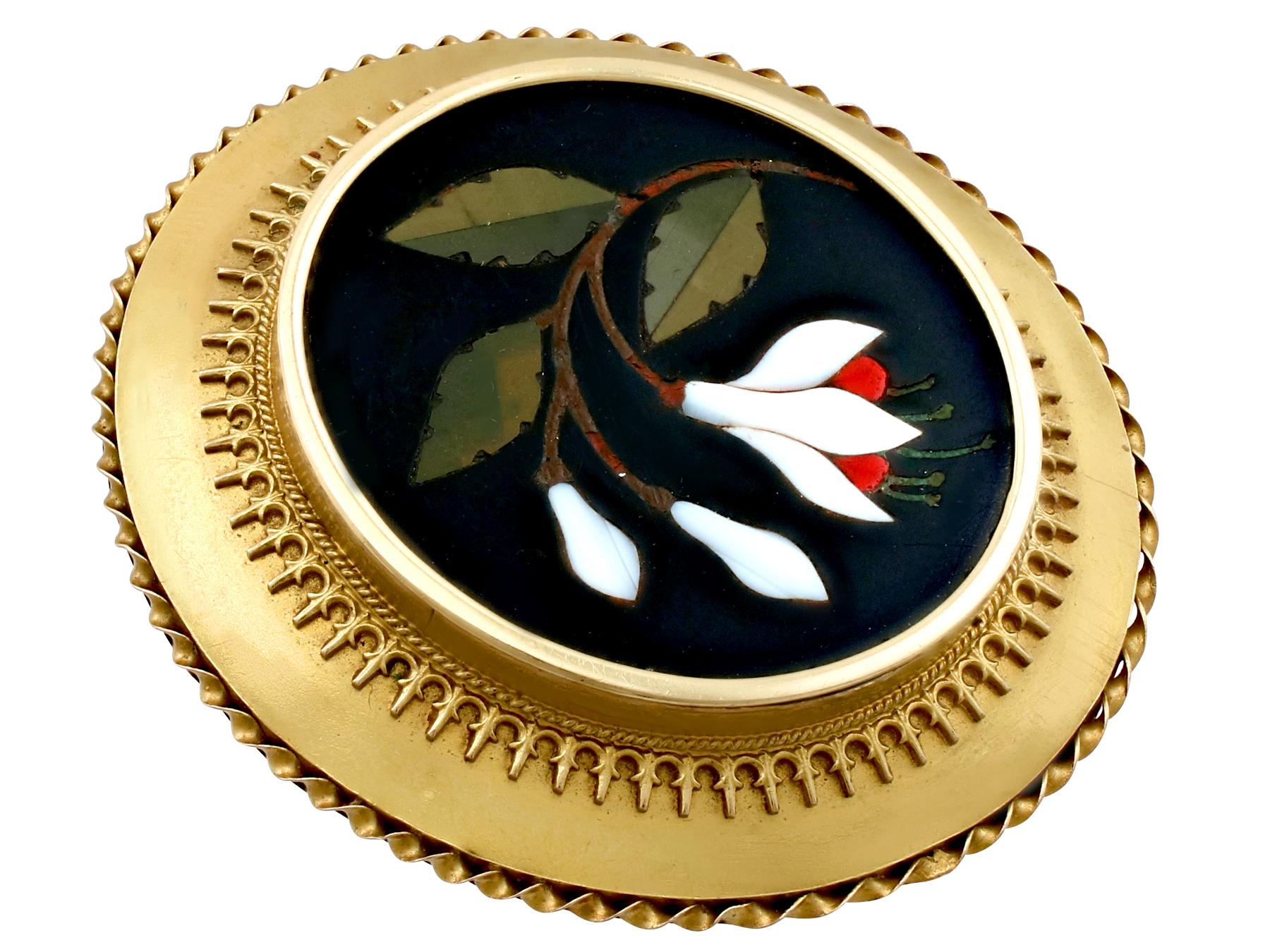 A stunning antique Victorian hardstone pietra dura and 18 karat yellow gold locket brooch; part of our diverse antique jewellery and estate jewelry collections.

This stunning, fine and impressive Victorian pietra dura brooch has been crafted in 18k