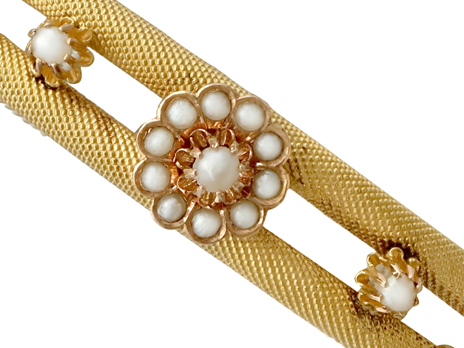 An exceptional, fine and impressive antique Victorian pearl and 22k yellow gold bangle; part of our antique jewelry and estate jewelry collections

This exceptional, fine and impressive antique bangle has been crafted in 22k yellow gold.

The body
