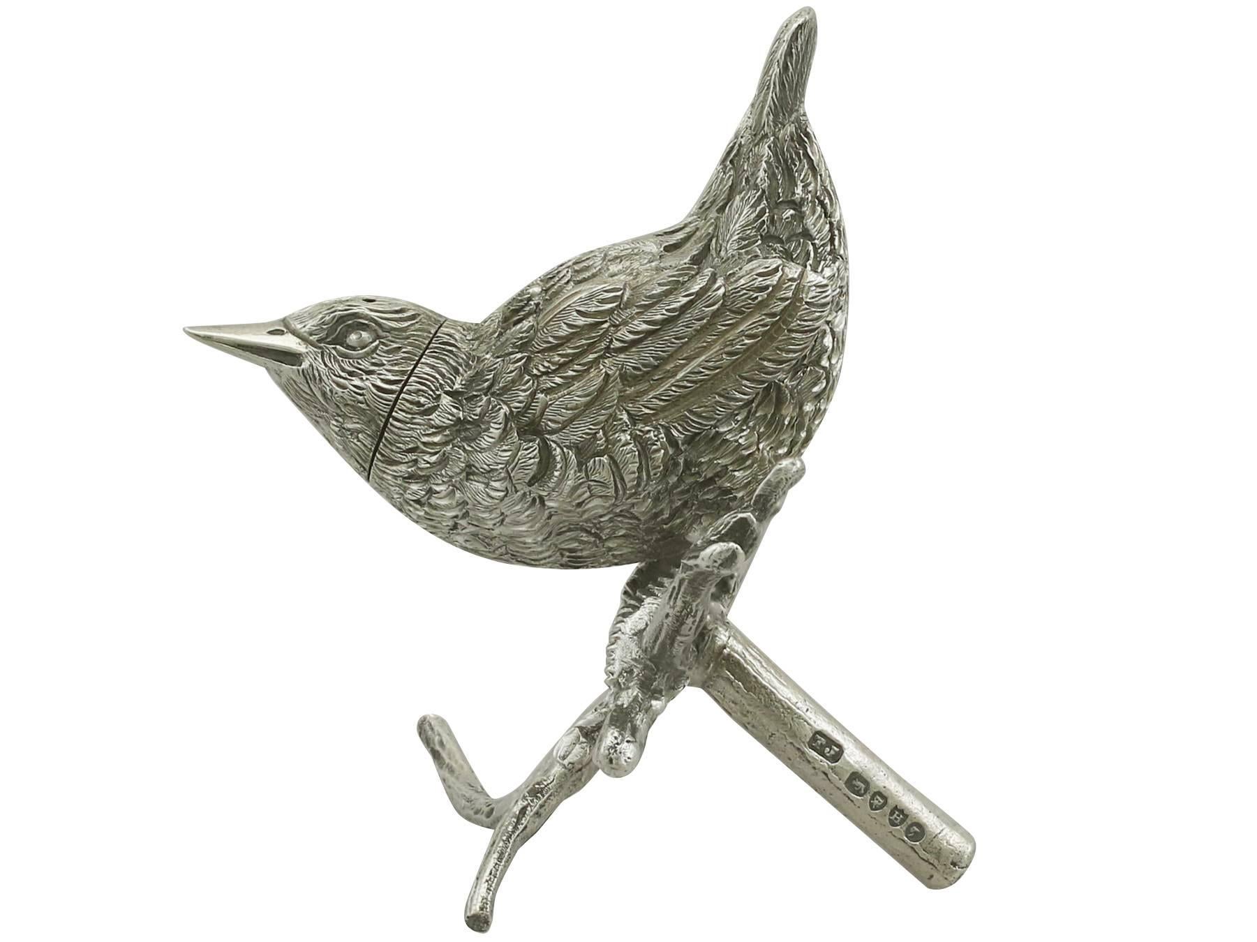 An exceptional, fine and impressive antique Victorian English cast sterling silver pepperette realistically modelled in the form of a bird; an addition to our range of silver novelty items.

This exceptional antique Victorian sterling silver