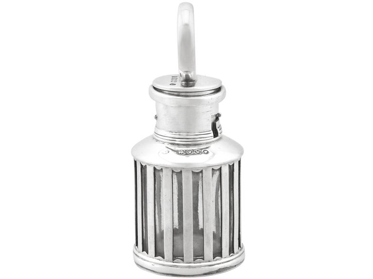 An exceptional, fine and impressive, unusual antique Victorian English sterling silver inkwell in the form of a lantern; an addition to our ornamental silverware collection.

This exceptional antique Victorian sterling silver inkwell has been