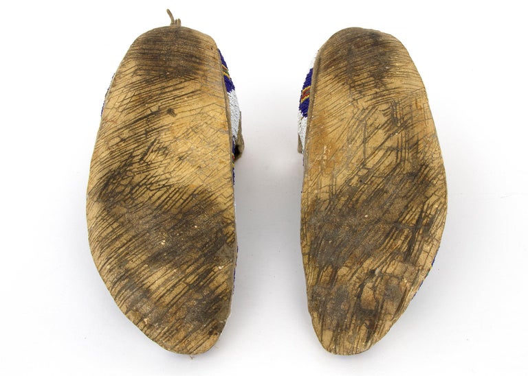 American 1880s Arapaho Moccasins Made of Native Tanned Hide with Glass Trade Beads  For Sale