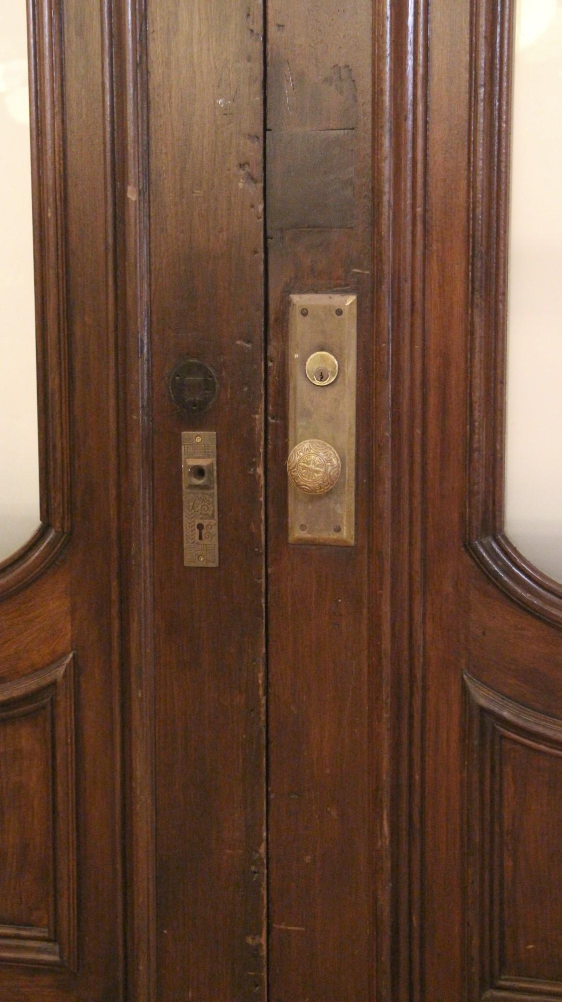 American 1880s Arched Walnut Brownstone Entry Double Doors with Frosted Glass & Hardware