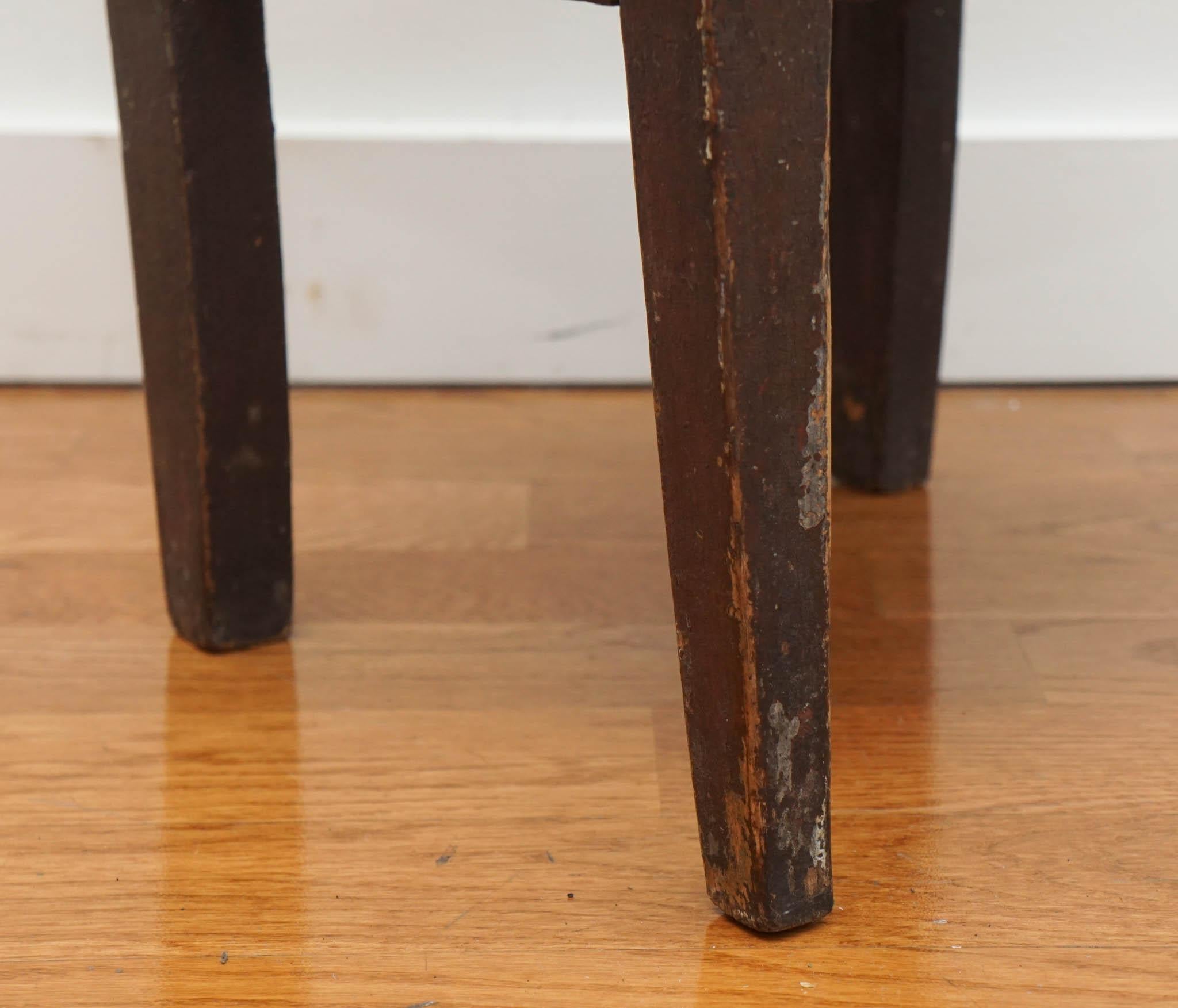 The antique miniature chair, shown here, is from Kim Antons & Co., Denmark. Made during the 1880s, the scale and age-worn patina of the chair make it uniquely special.