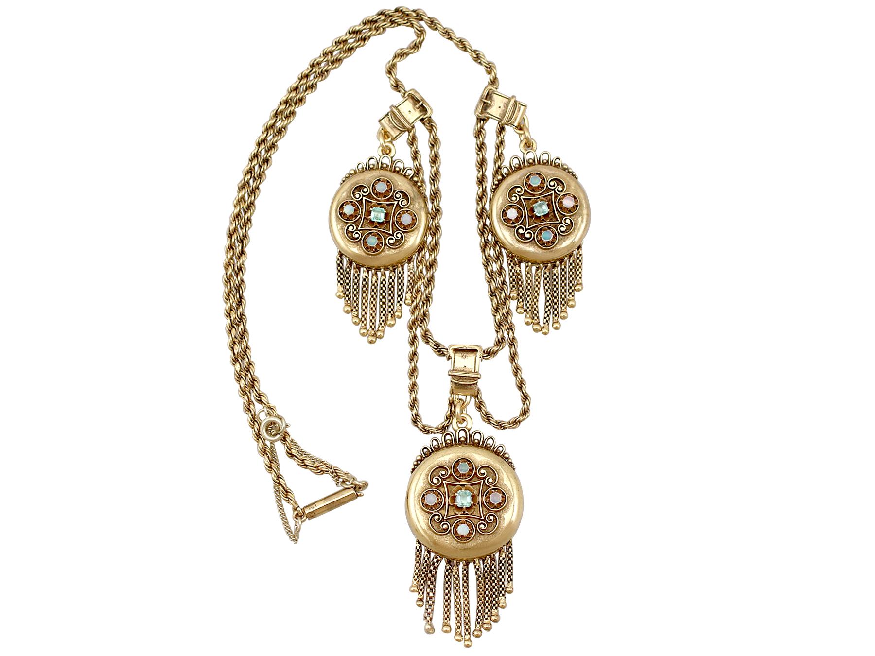 This exceptional, fine and impressive antique Victorian three locket necklace has been crafted in 15k yellow gold.

The three lockets/pendants have circular, cushion style designs accented with applied geometric decoration to each anterior