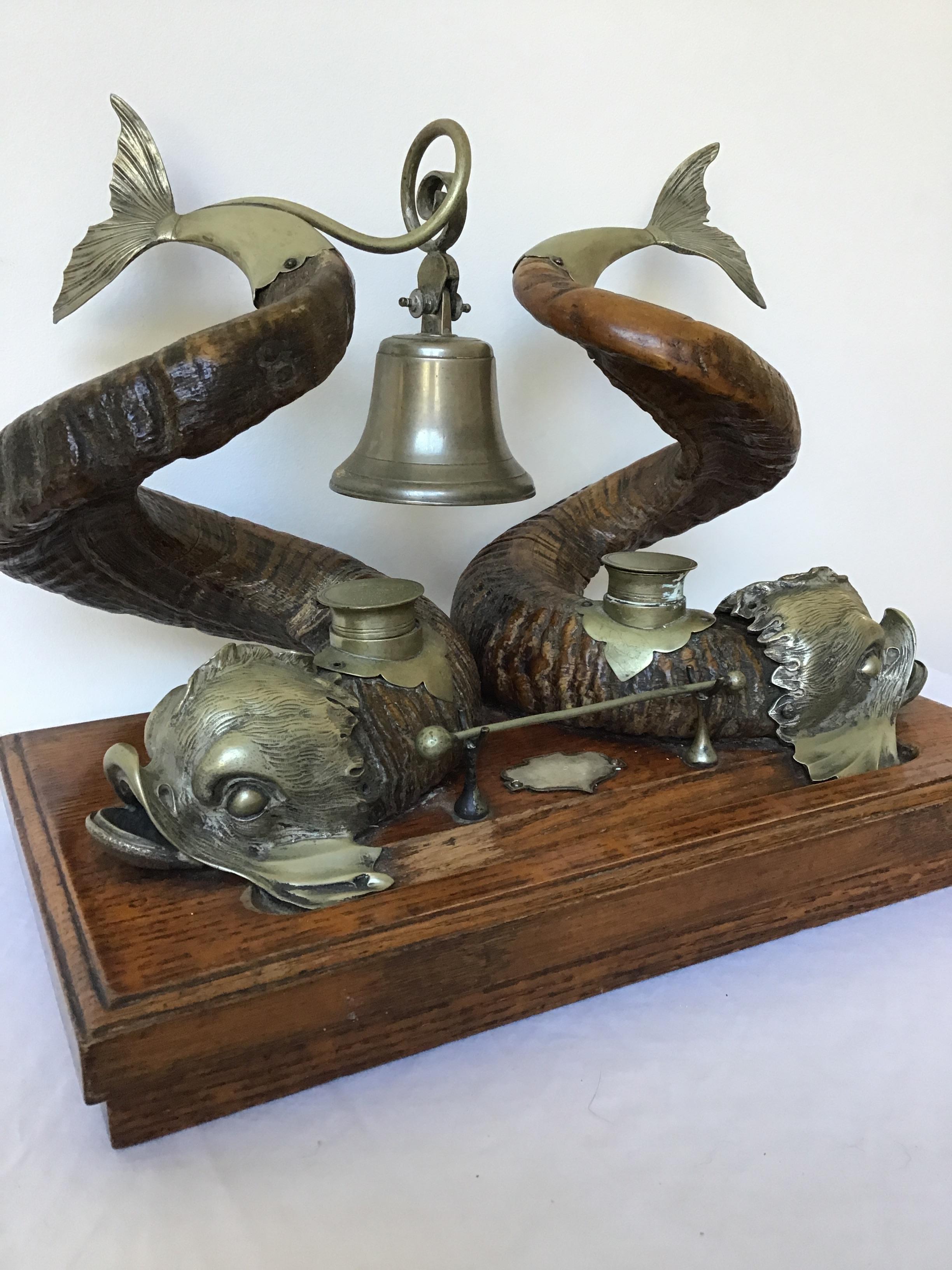 1880s English ram horn and silver plate dolphin inkwell. Bell and striker to call for the help. On oak base. Plate is blank on one side so it can be monogrammed.